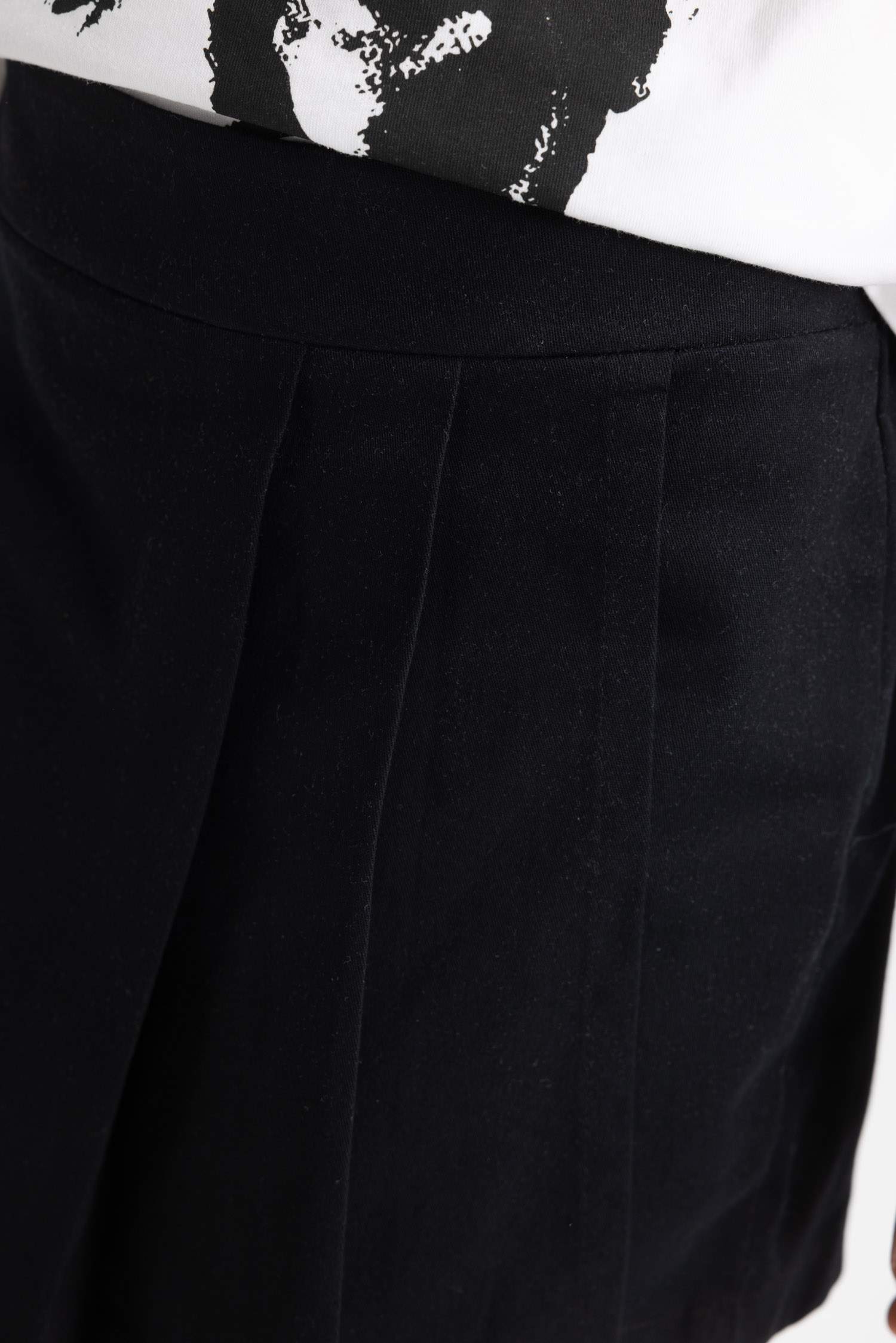 تنورة اسود بناتي بكسرات