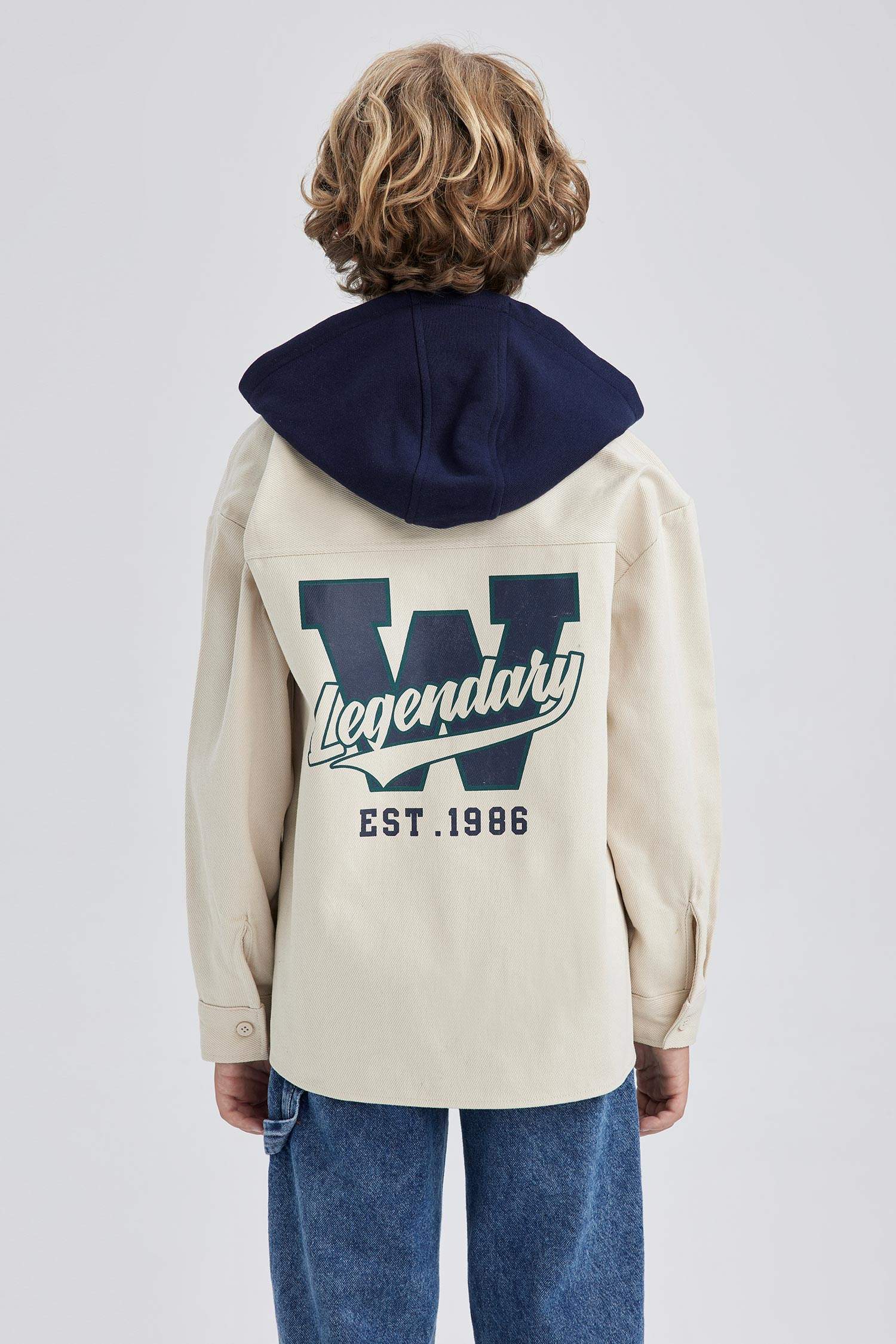 قميص اولادي اوفر سايز كم طويل بكابيشون