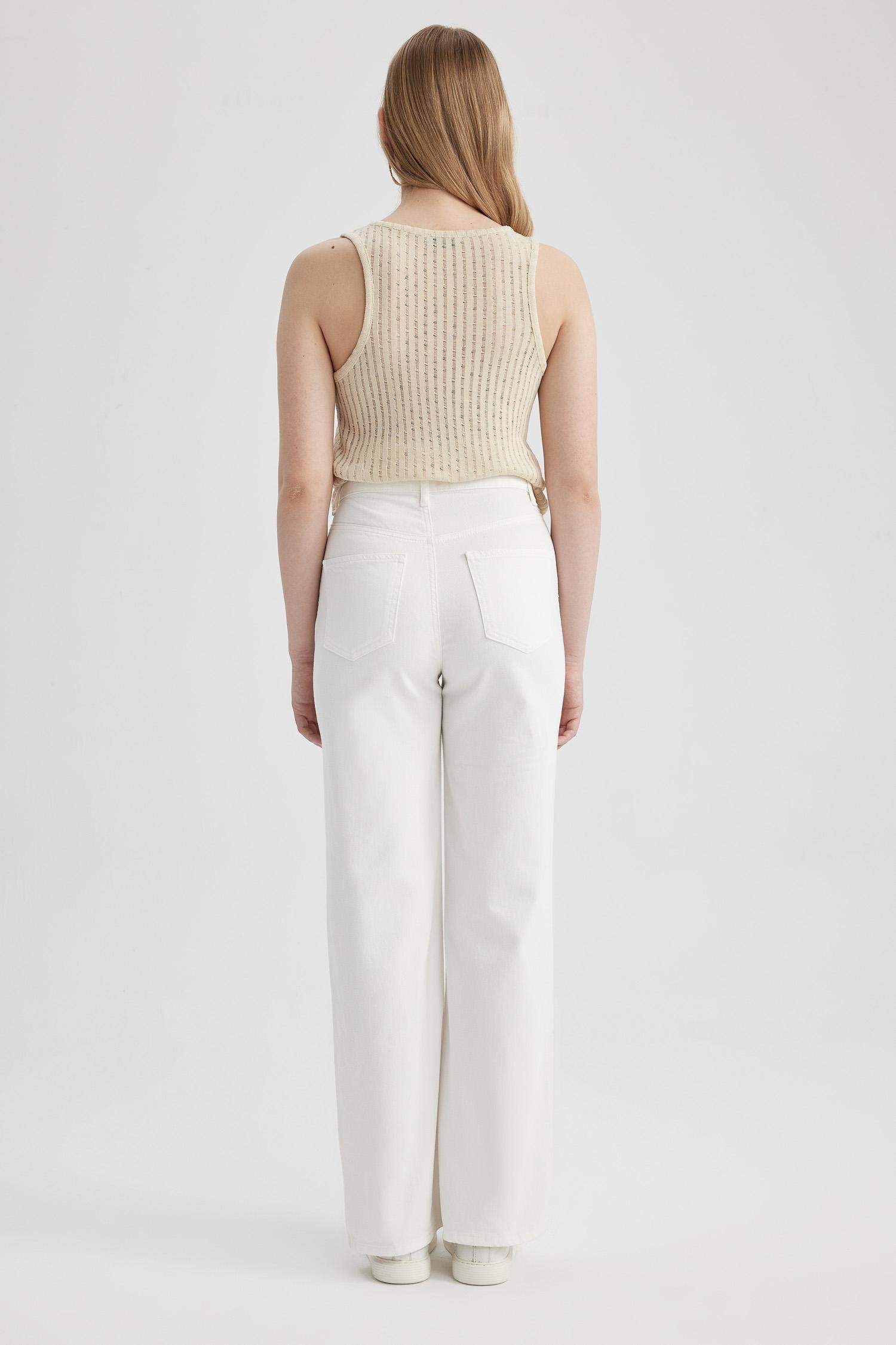 Джинсы клеш в стиле 90-х