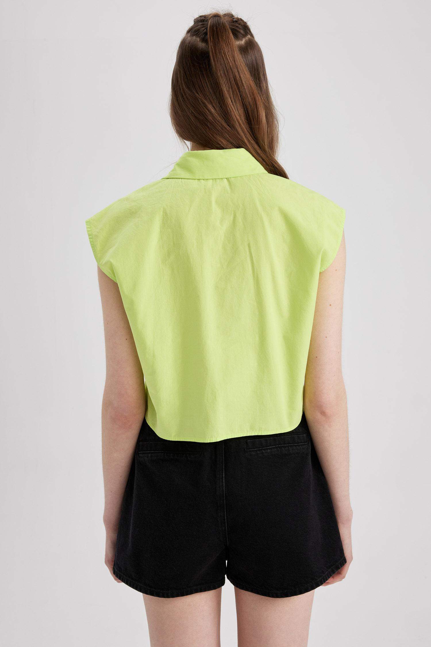 قميص بوبلين بدون ردن بقصة مريحة