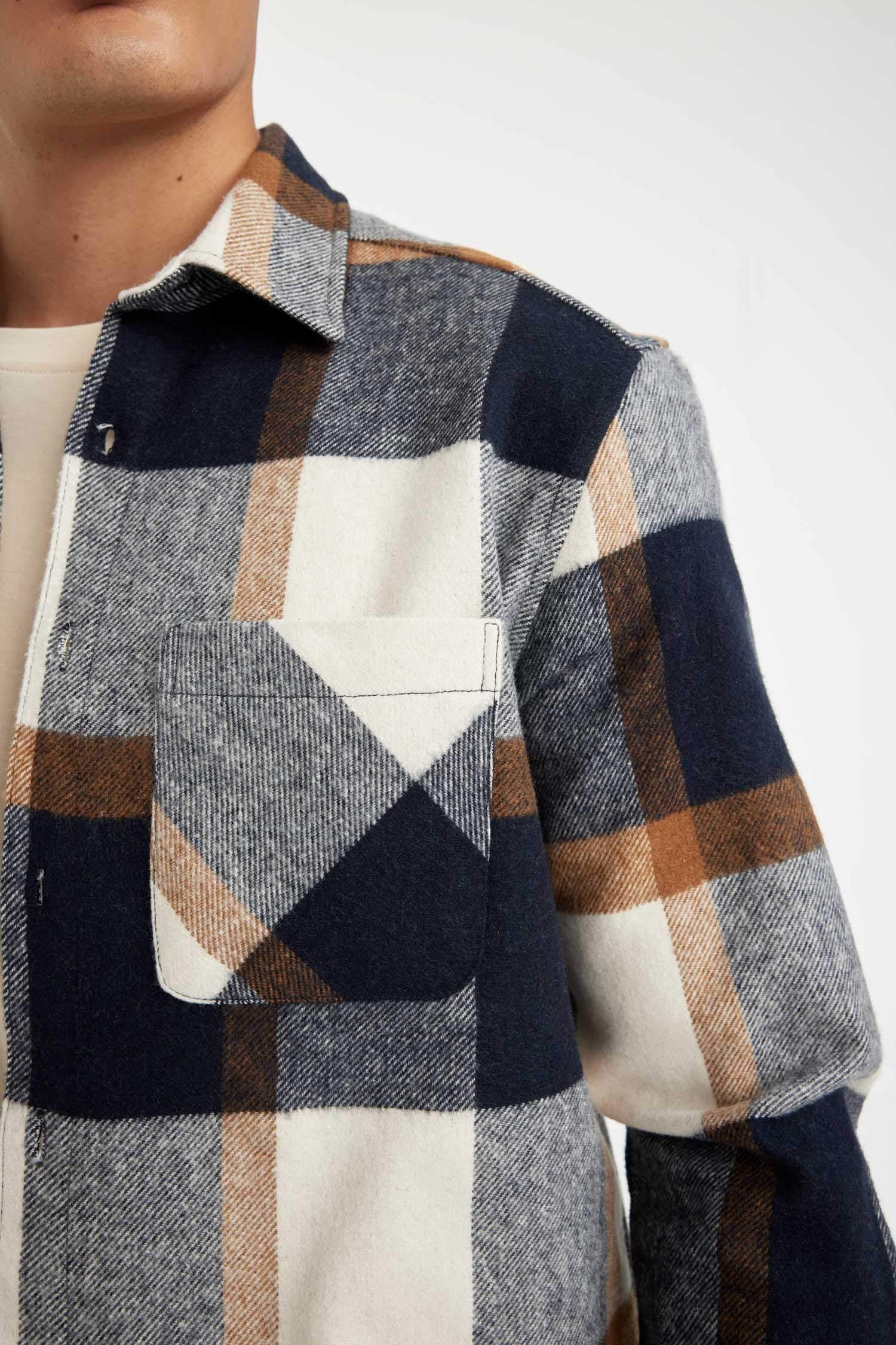 قميص بولو كاروهات ردن طويل قصة عادية