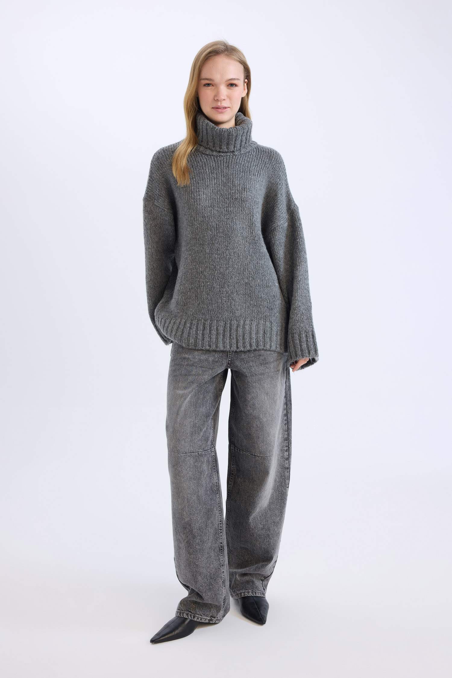 بلوز صوف تريكو سادة اوفر سايز بياخة عالية