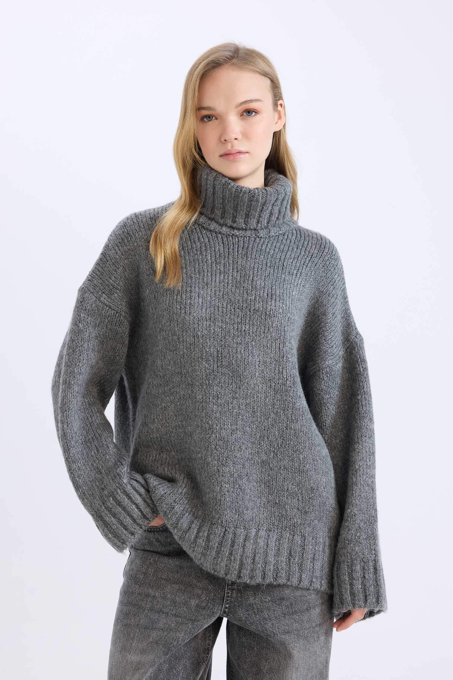 بلوز صوف تريكو سادة اوفر سايز بياخة عالية