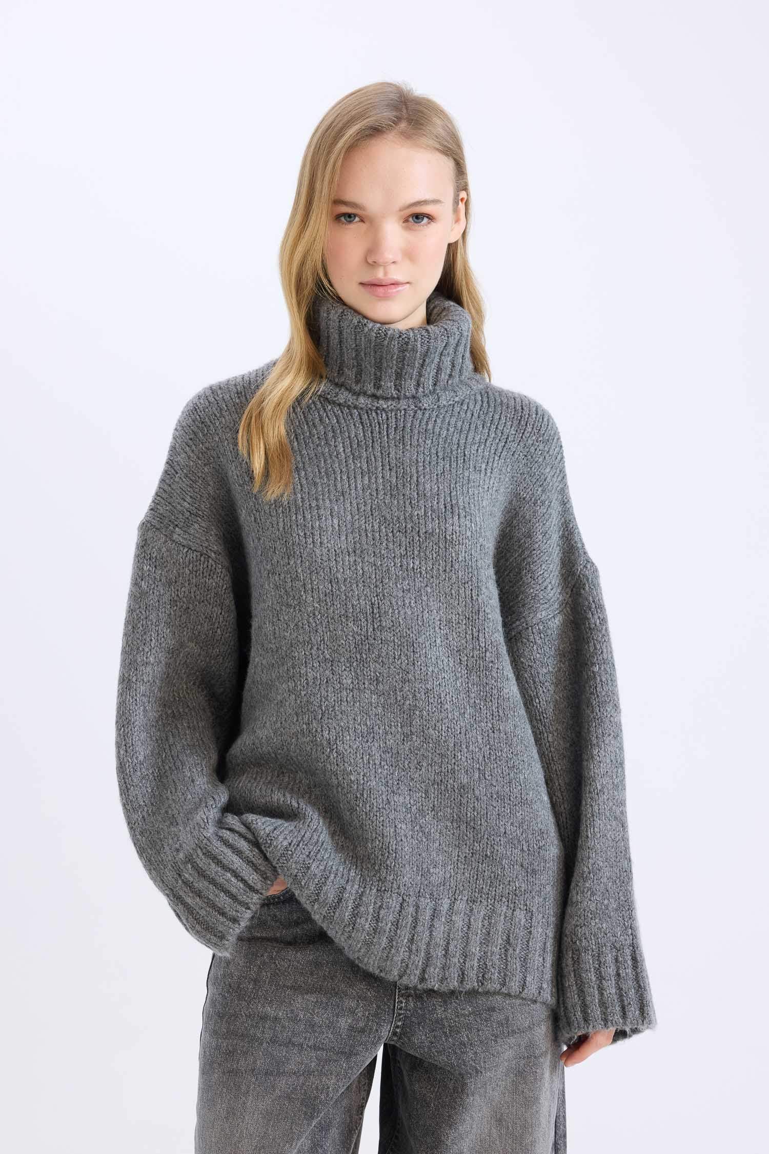 بلوز صوف تريكو سادة اوفر سايز بياخة عالية