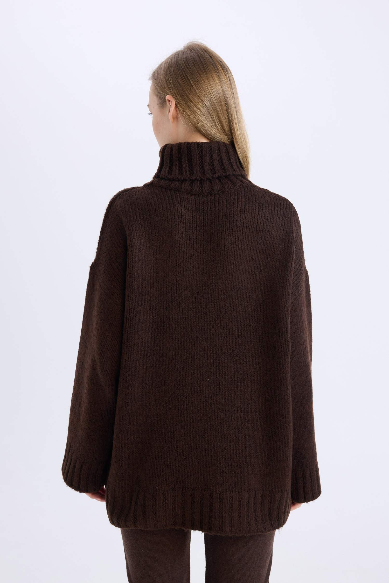 بلوز صوف تريكو طويل اوفر سايز بياخة عالية