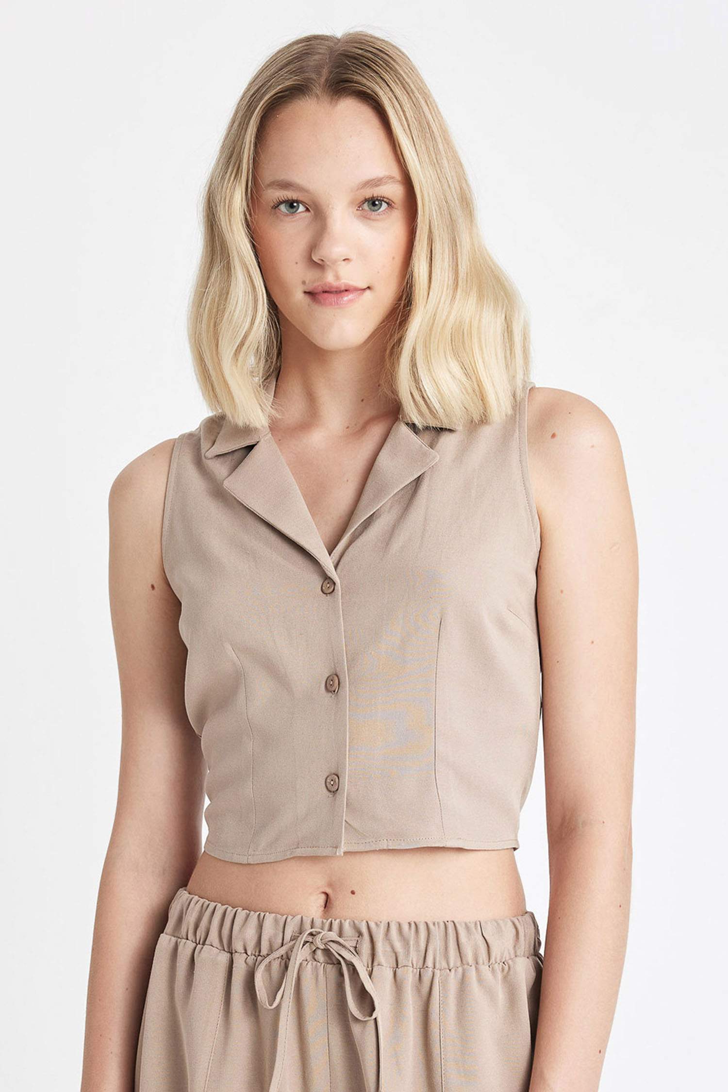 قميص بدون ردن ممزوج بالكتان وياخة بجامة