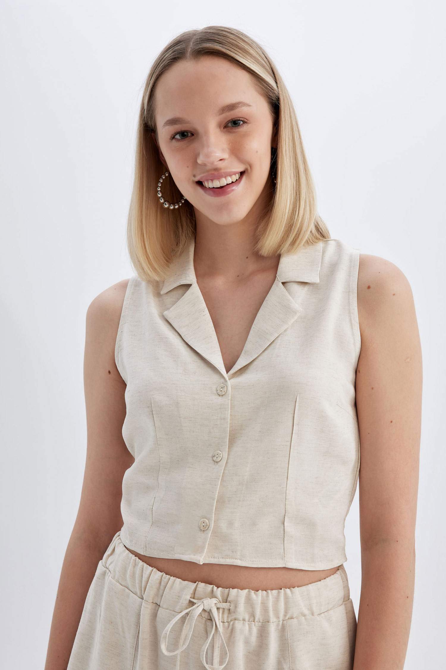 قميص بدون ردن ممزوج بالكتان وياخة بجامة