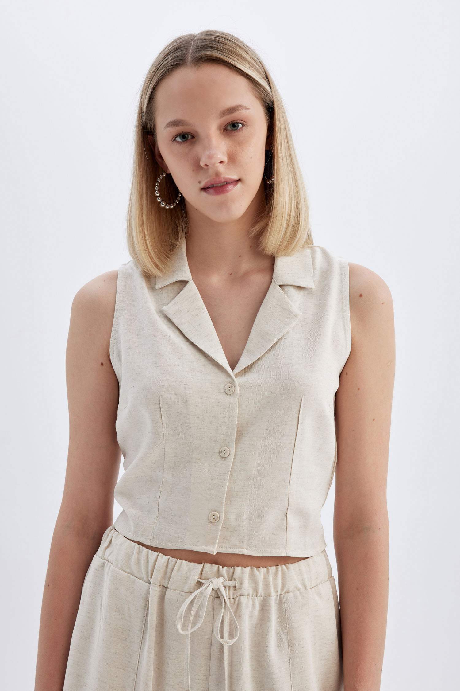 قميص بدون ردن ممزوج بالكتان وياخة بجامة