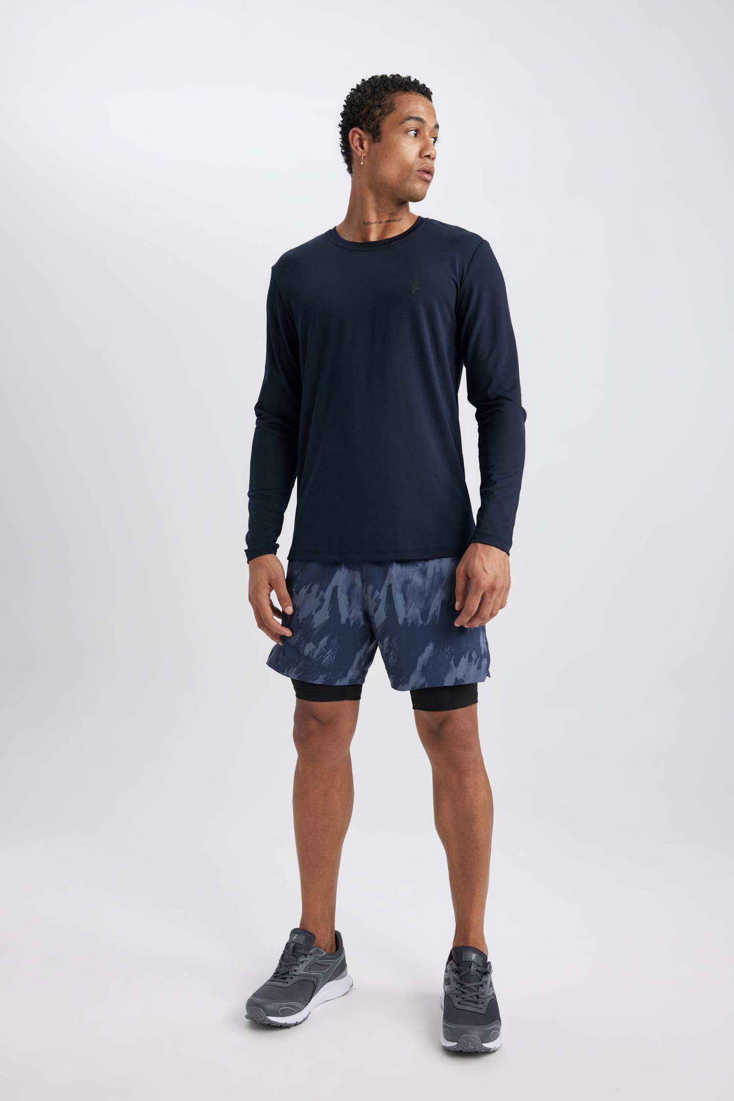 DeFactoFit Slim Fit Dar Kesim Desenli Cepli Taytlı Dokuma Şort