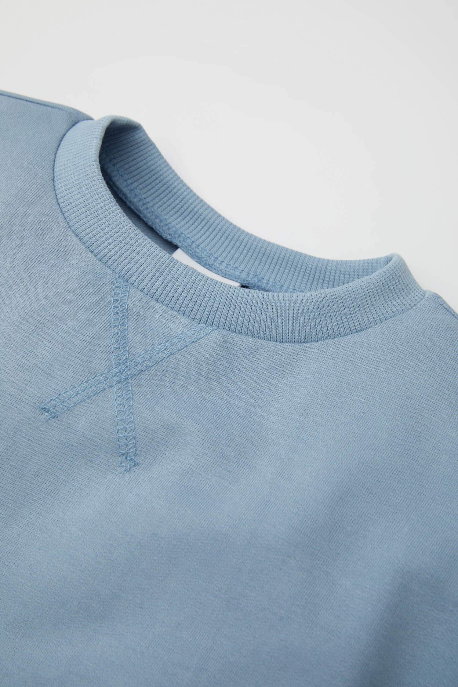 سويت شيرت قصة عادية برقبة مستديرة