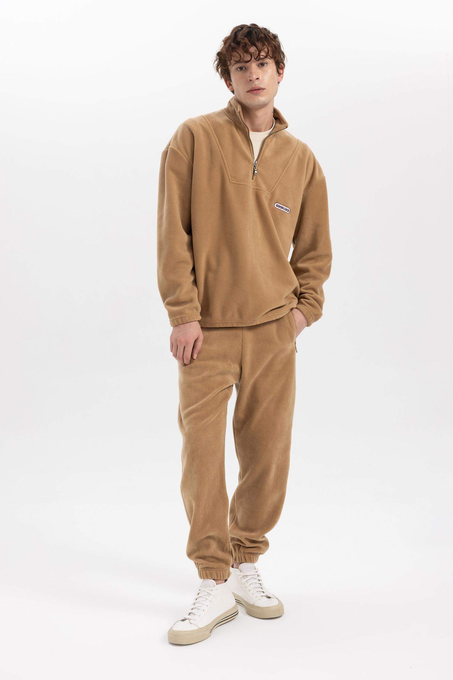 سويت شيرت قصة مريحة بياخة عالية بسحاب