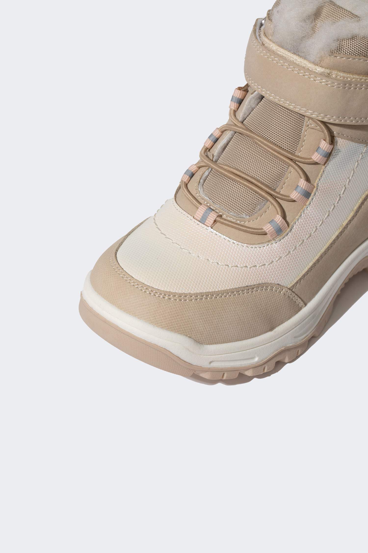 بوت بناتي جلد صناعي بكعب مسنن