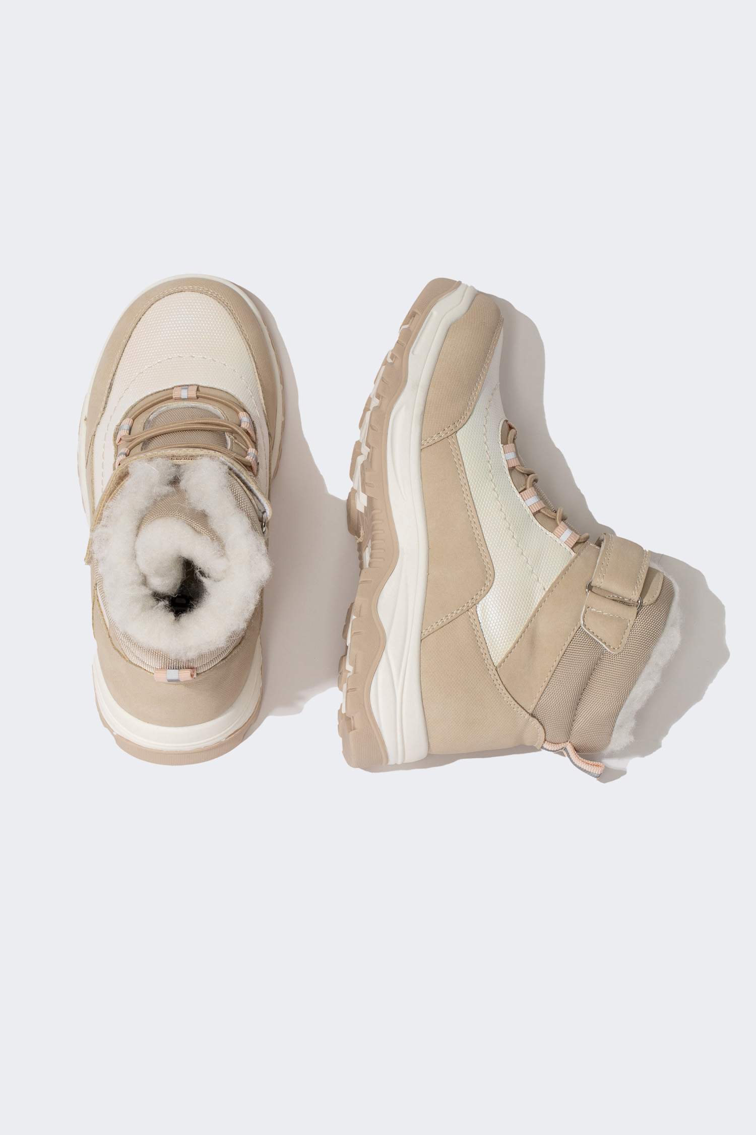 بوت بناتي جلد صناعي بكعب مسنن