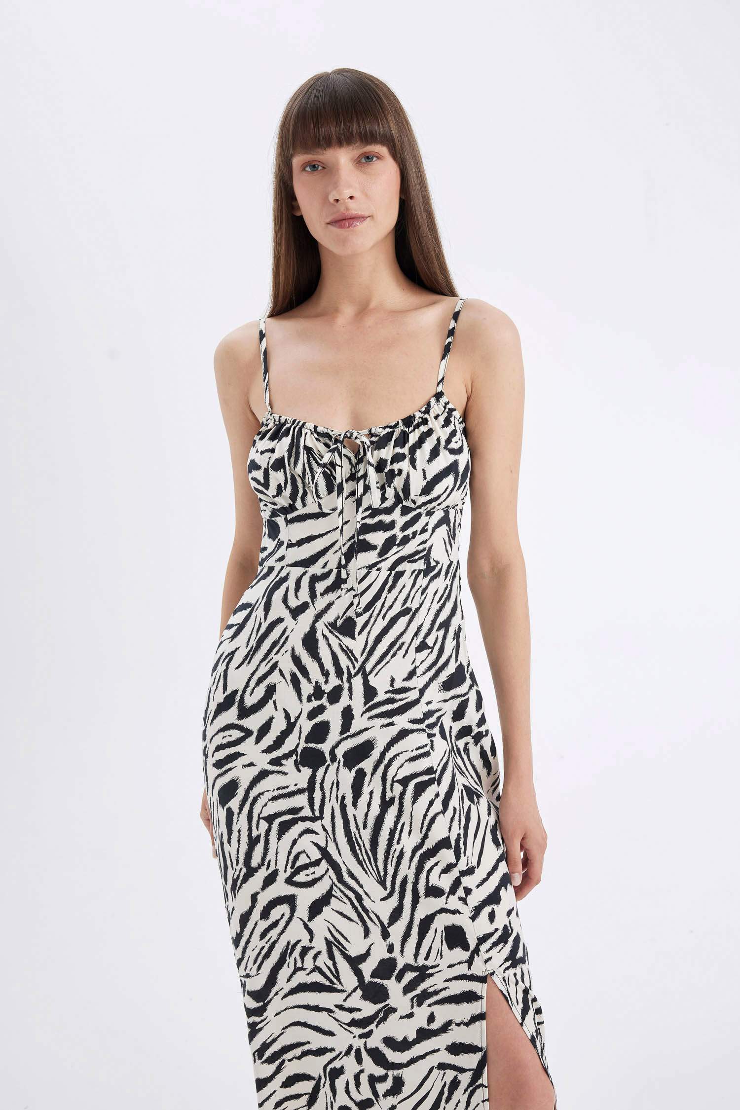 فستان طويل زيبرا مطبوع فيسكوز بقصة A وياخة قلب