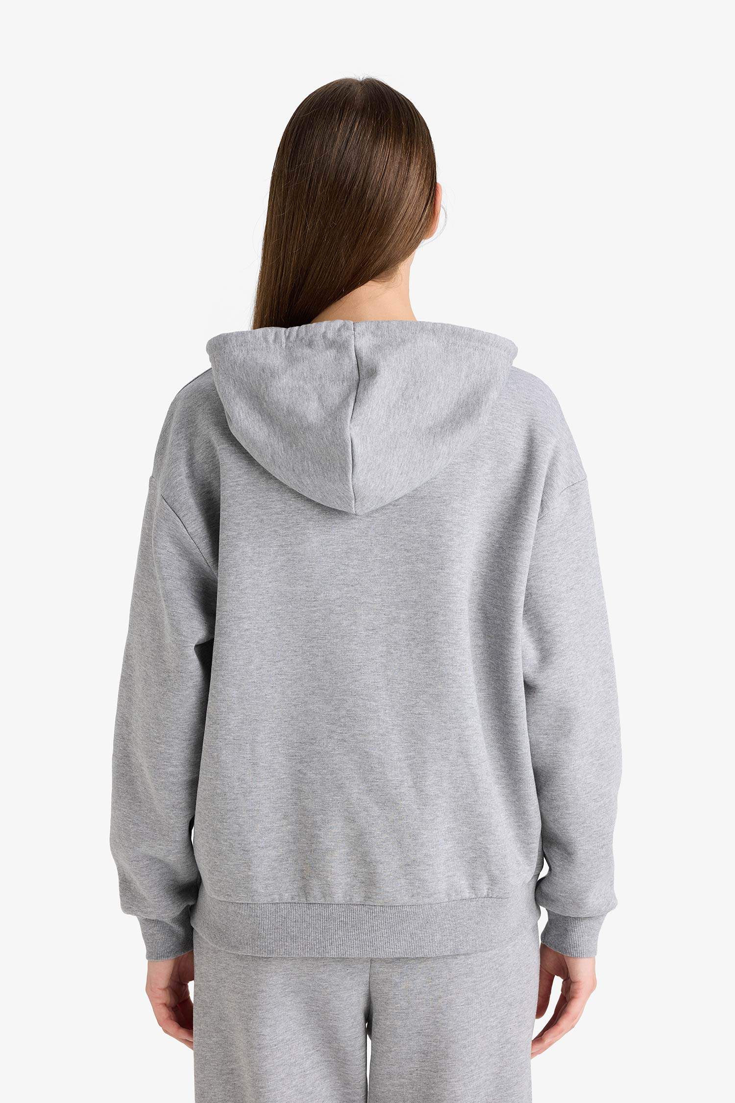 سويت شيرت بيزك قصة مريحة بكابيشون