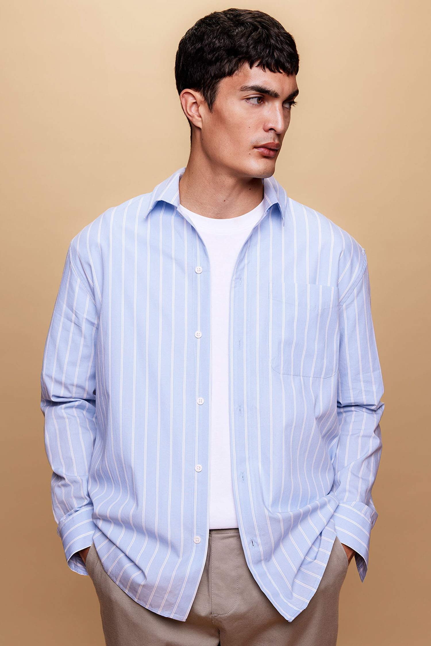 قميص بولو مخطط كم طويل قصة مريحة