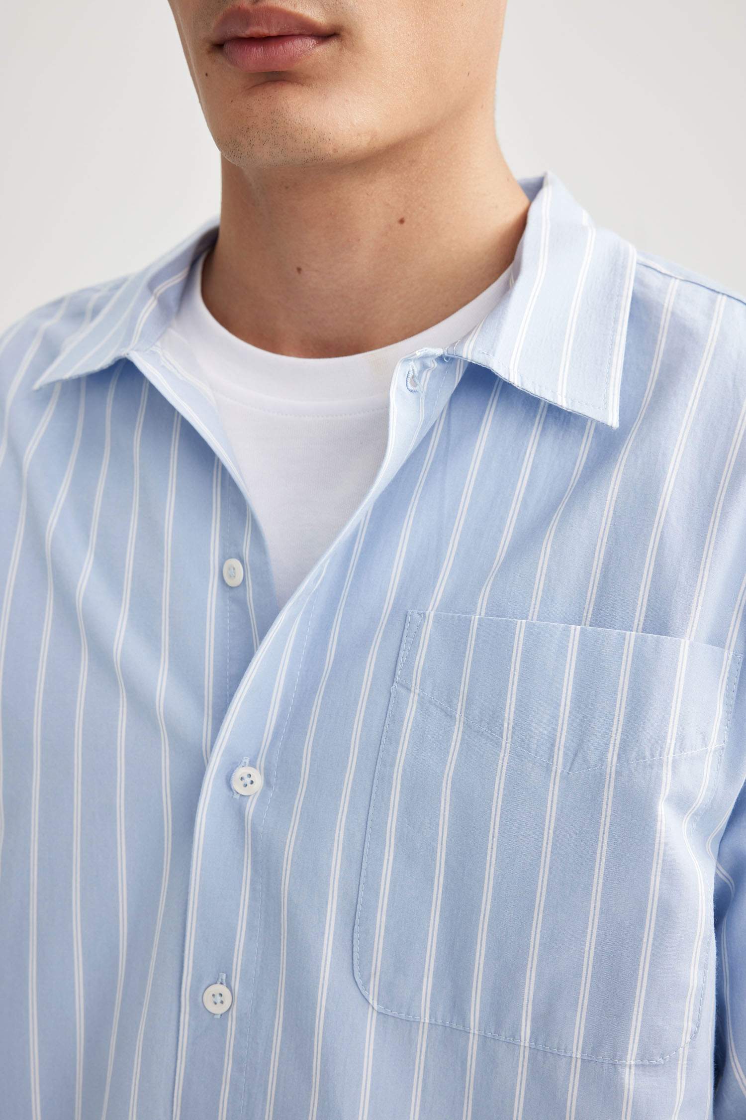 قميص بولو مخطط كم طويل قصة مريحة