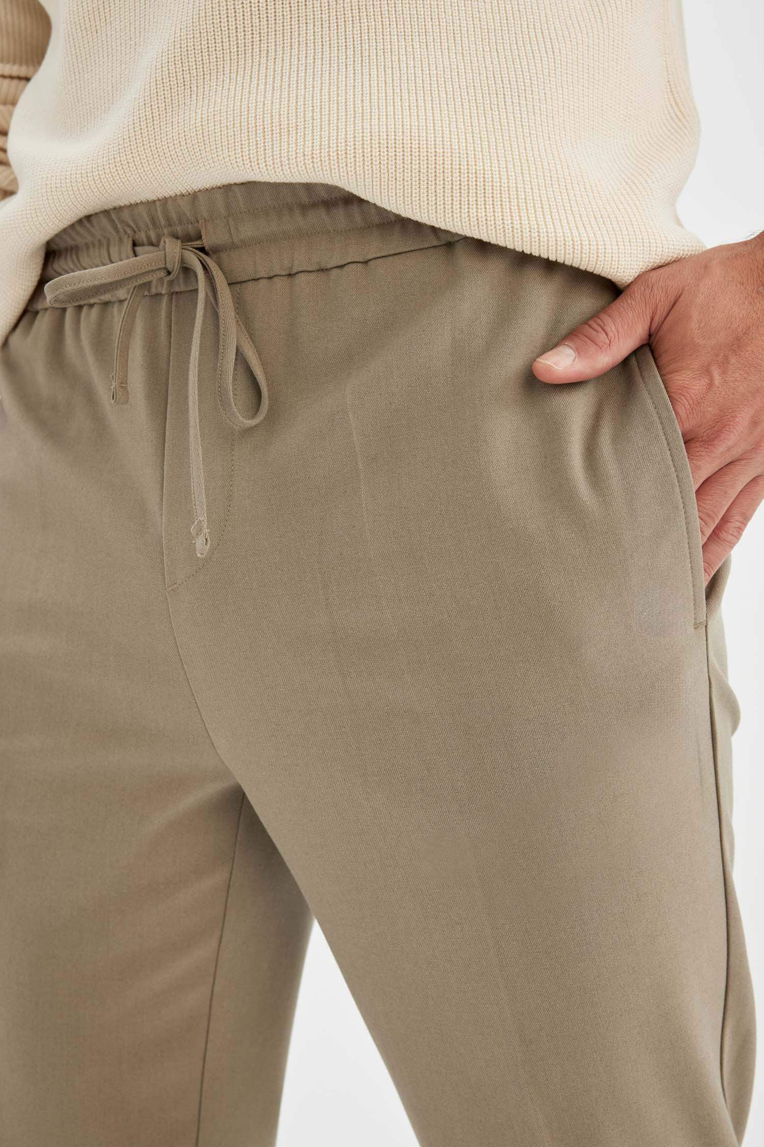 Yazlık Kumaş Jogger Pantolon Beli Bağcıklı Lastikli Düz Paça Cepli Her Yöne Esneyen