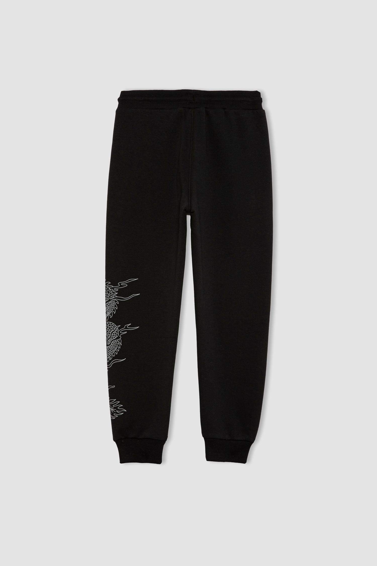 بنطلون سويت بانتس اولادي تقيل قصة عادية بأستك من تحت