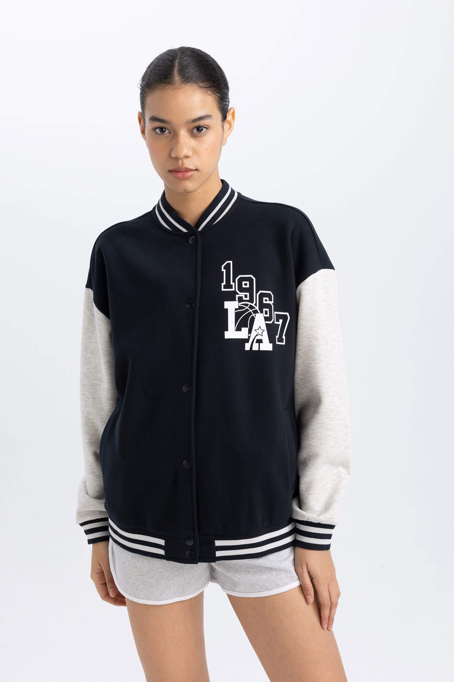 جاكيت بومبر اوفر سايز بجيب من DeFacto Fit