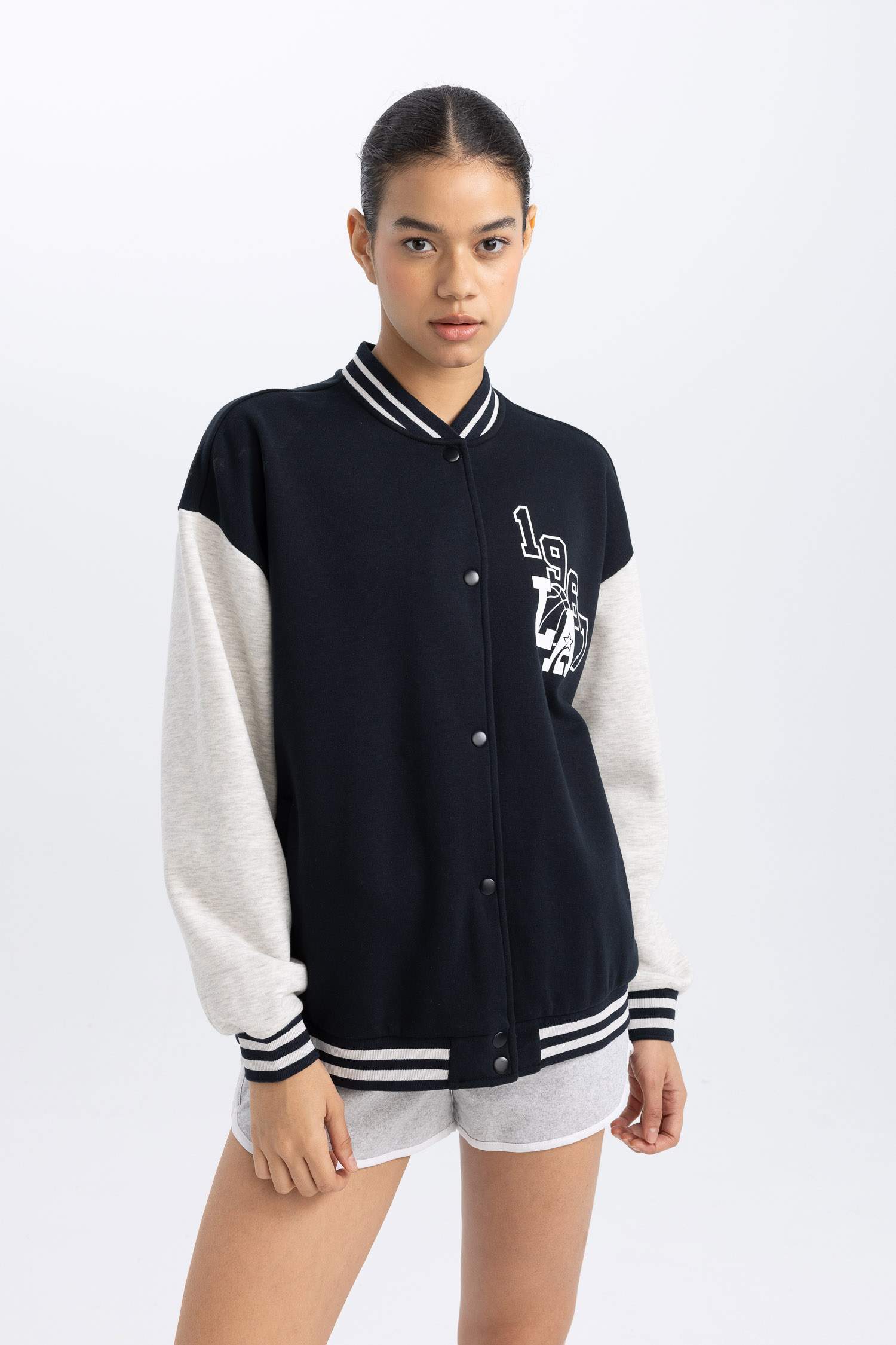 جاكيت بومبر اوفر سايز بجيب من DeFacto Fit