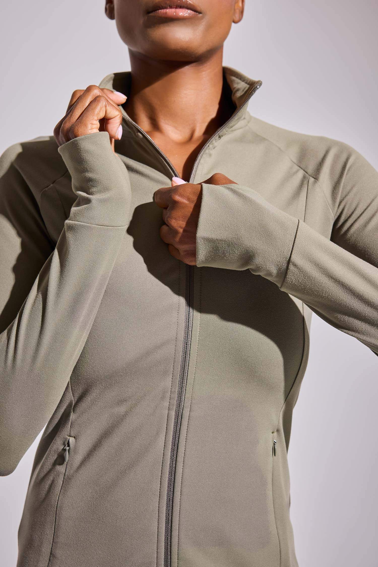 DeFactoFit Fitted Vücuda Oturan Ultra Soft Dik Yaka Çift Cepli Parmak Detaylı Fermuarlı Spor Hırka