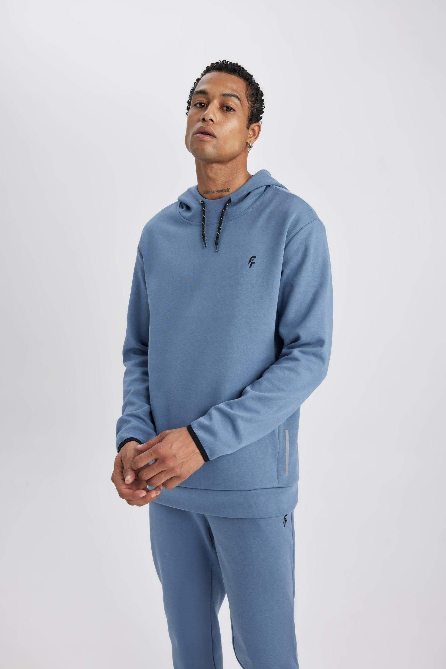 سويت شيرت قصة عادية بغطاء للرأس من DeFactoFit