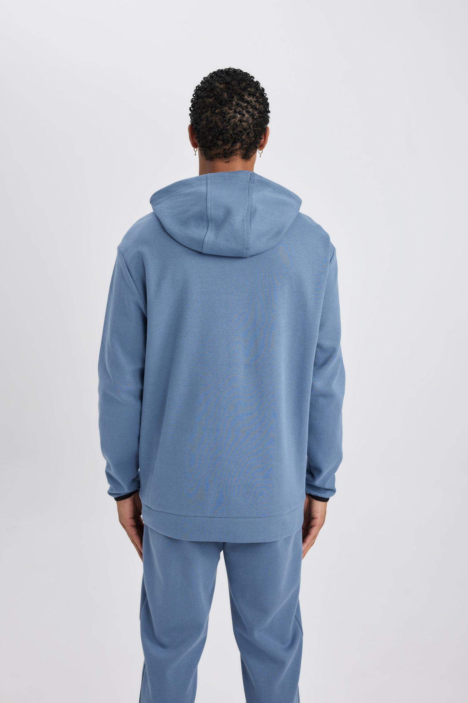 سويت شيرت قصة عادية بغطاء للرأس من DeFactoFit