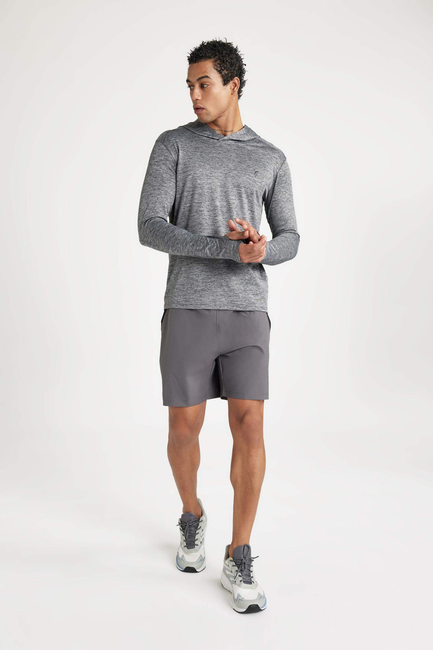 سويت شيرت رياضي سليم فيت بكابيشون من DeFactoFit