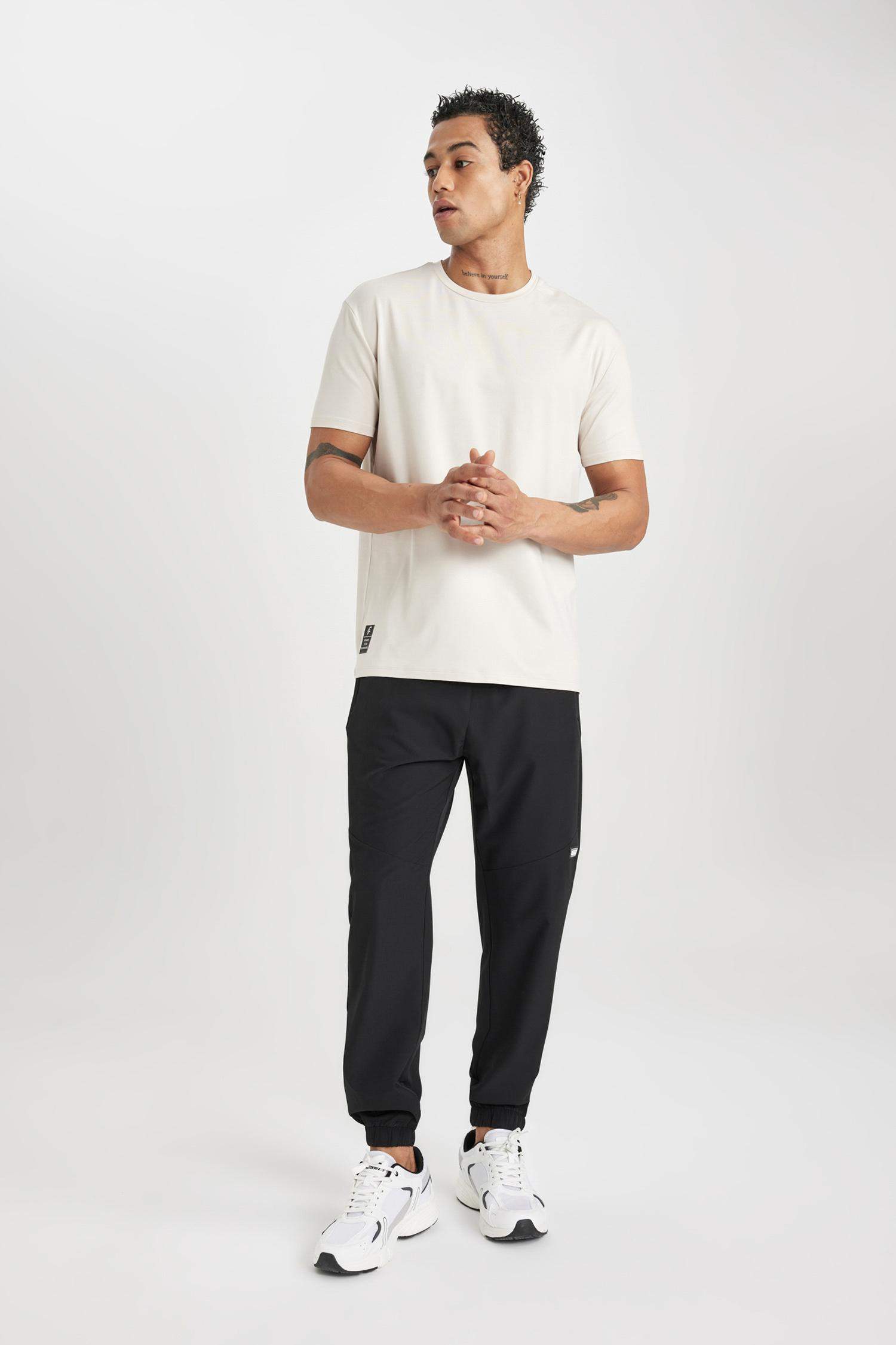 تى شيرت نص كم محبوك قصة عادية