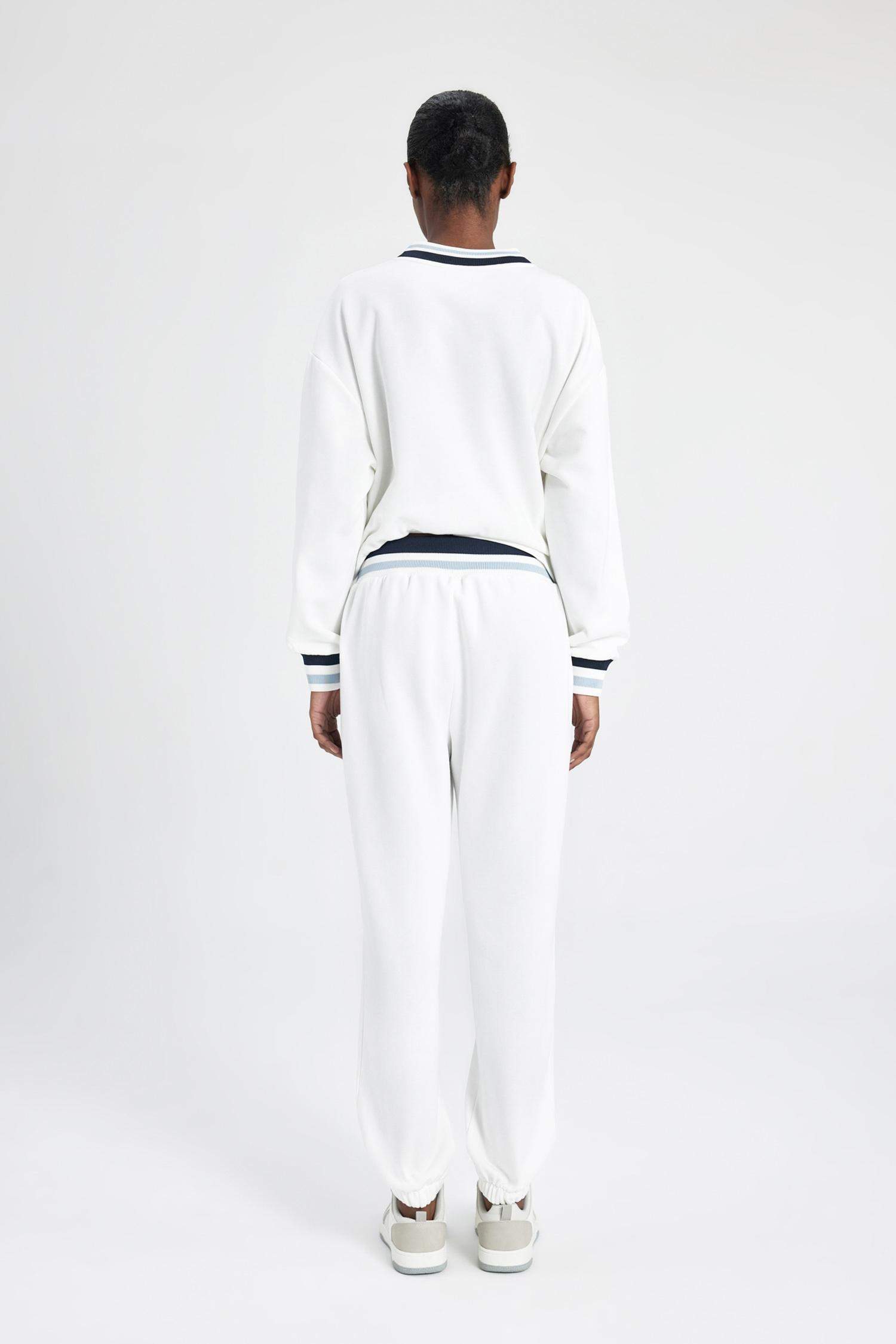 بنطلون بجامة رياضي قماش سميك قصة عادية بجيب من DeFactoFit