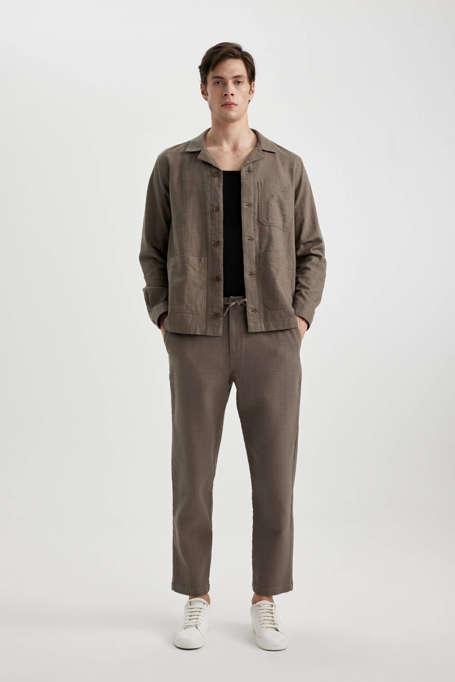 قميص قطن قصة عادية بياخة عالية