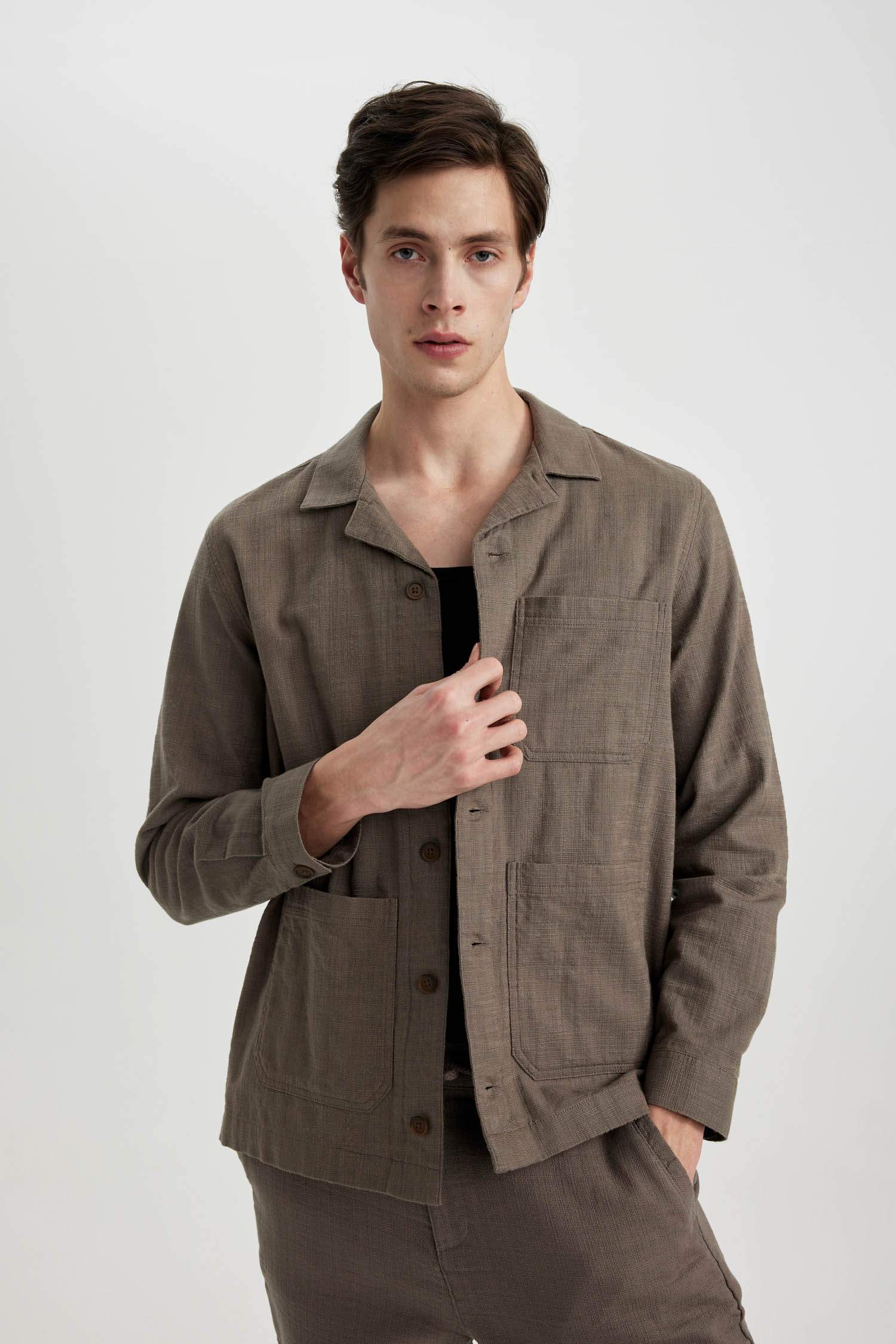 قميص قطن قصة عادية بياخة عالية