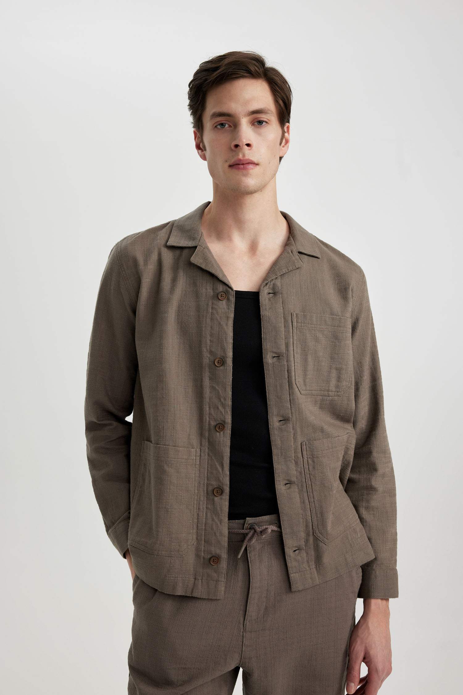 قميص قطن قصة عادية بياخة عالية