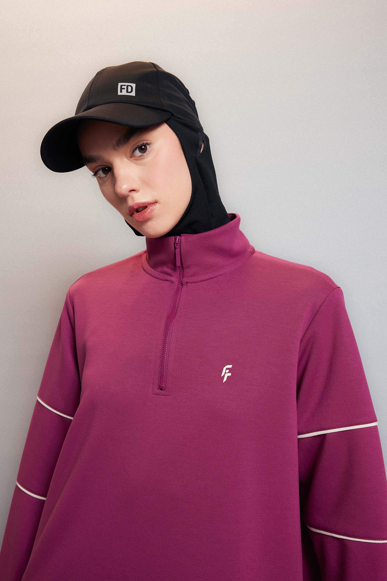 سويت شيرت رياضي اوفر سايز بياخة عالية بنصف سحاب من DeFactoFit