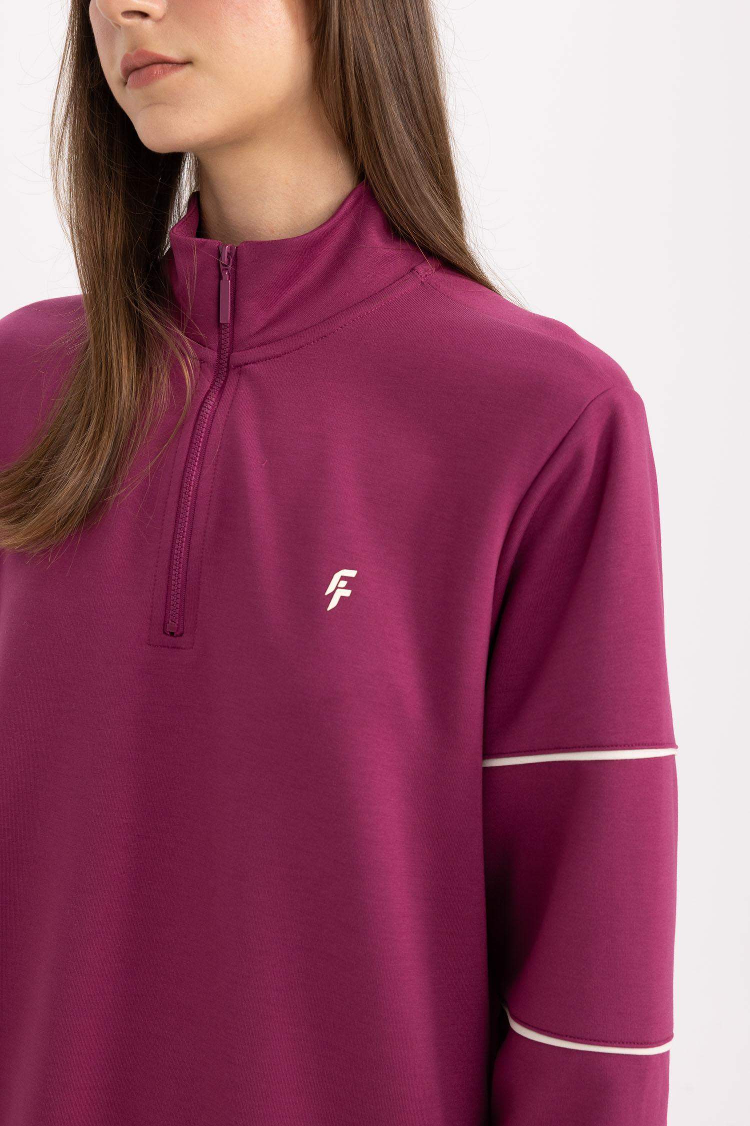 سويت شيرت رياضي اوفر سايز بياخة عالية بنصف سحاب من DeFactoFit