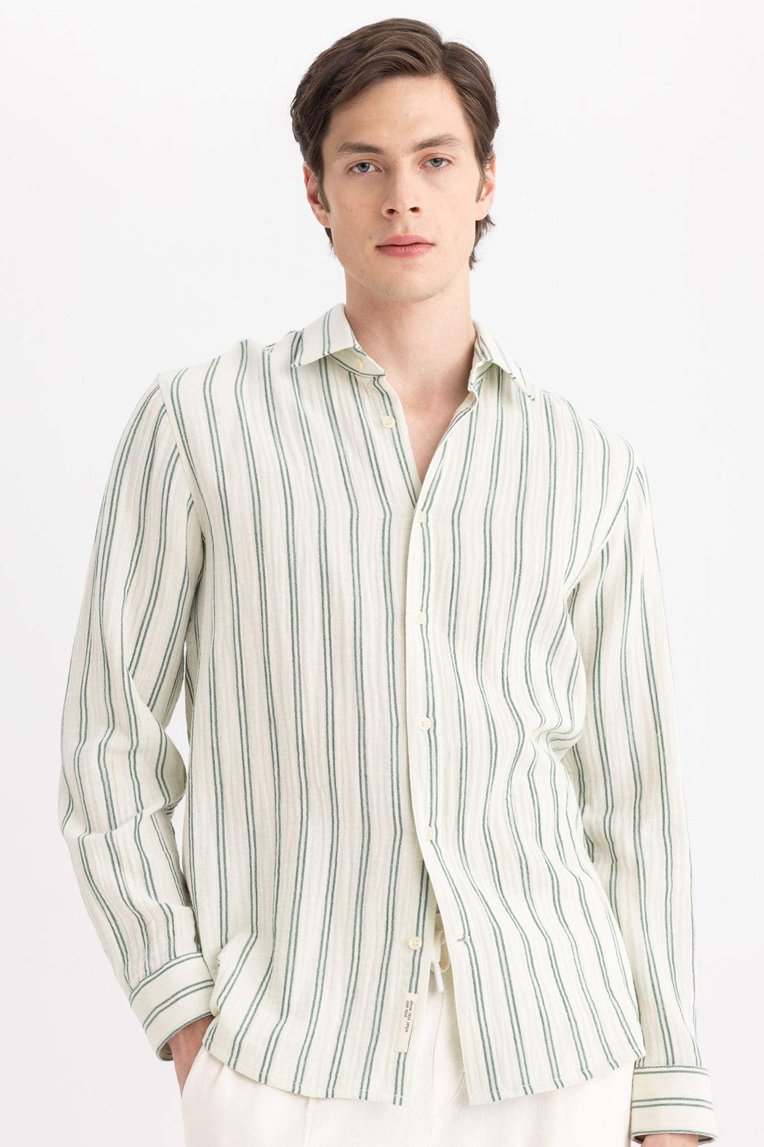 قميص بولو مخطط كم طويل قصة عادية