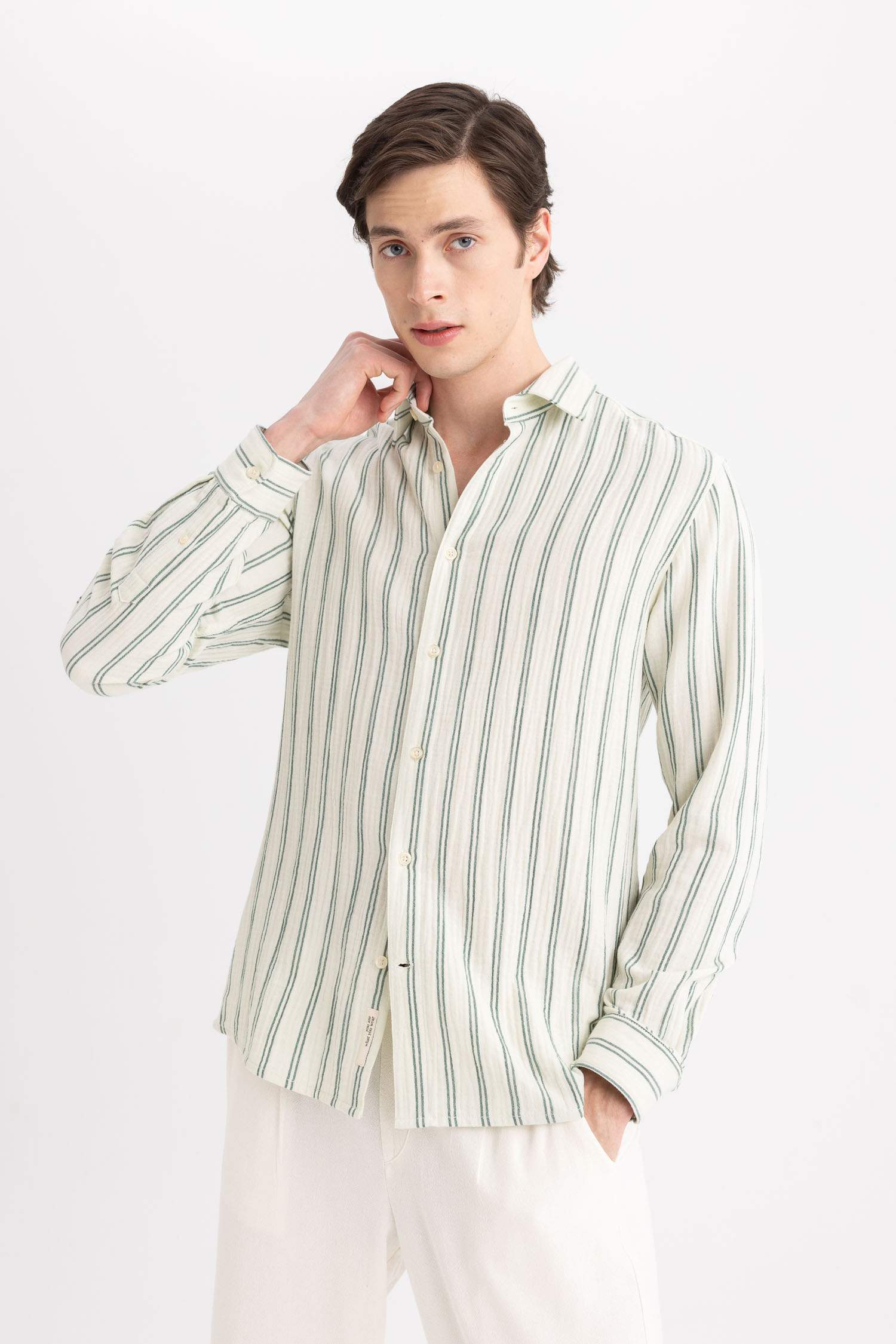 قميص بولو مخطط كم طويل قصة عادية