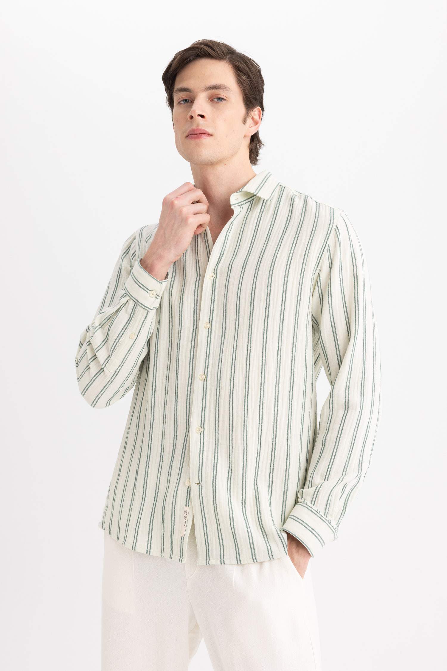 قميص بولو مخطط كم طويل قصة عادية