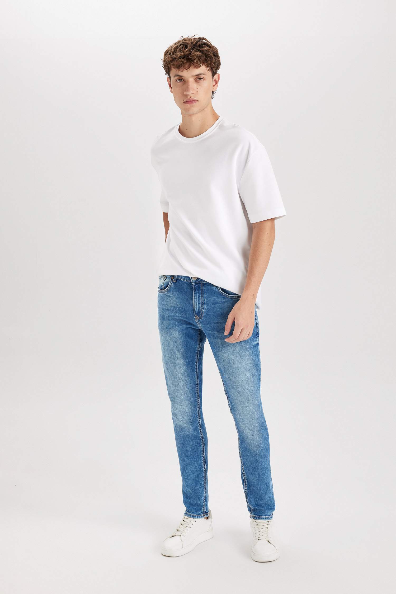 بنطرون جينز كارلو سكيني فيت بخصر عادي