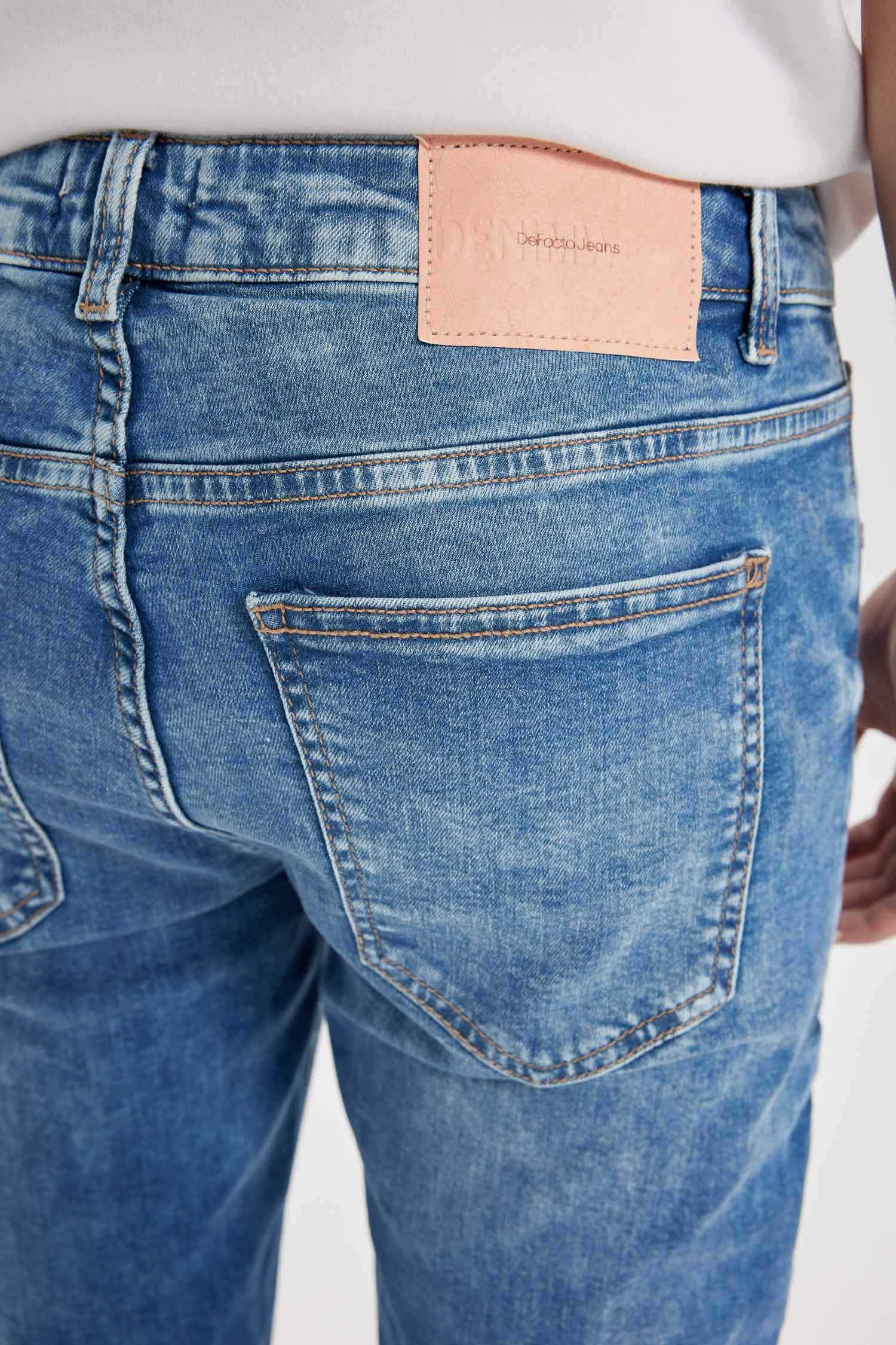 بنطرون جينز كارلو سكيني فيت بخصر عادي