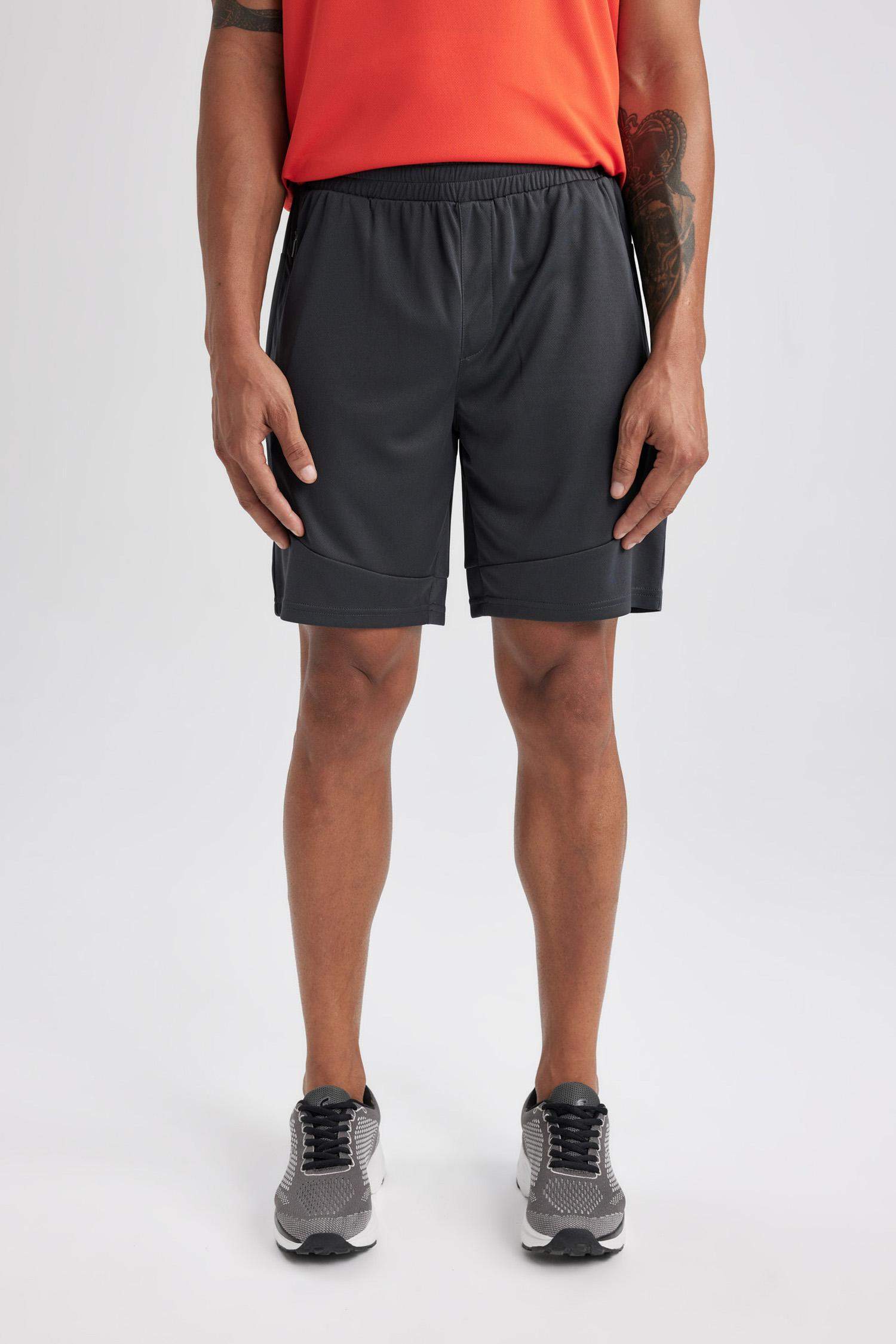 شورت رياضي قصير سليم فيت من DeFactoFit