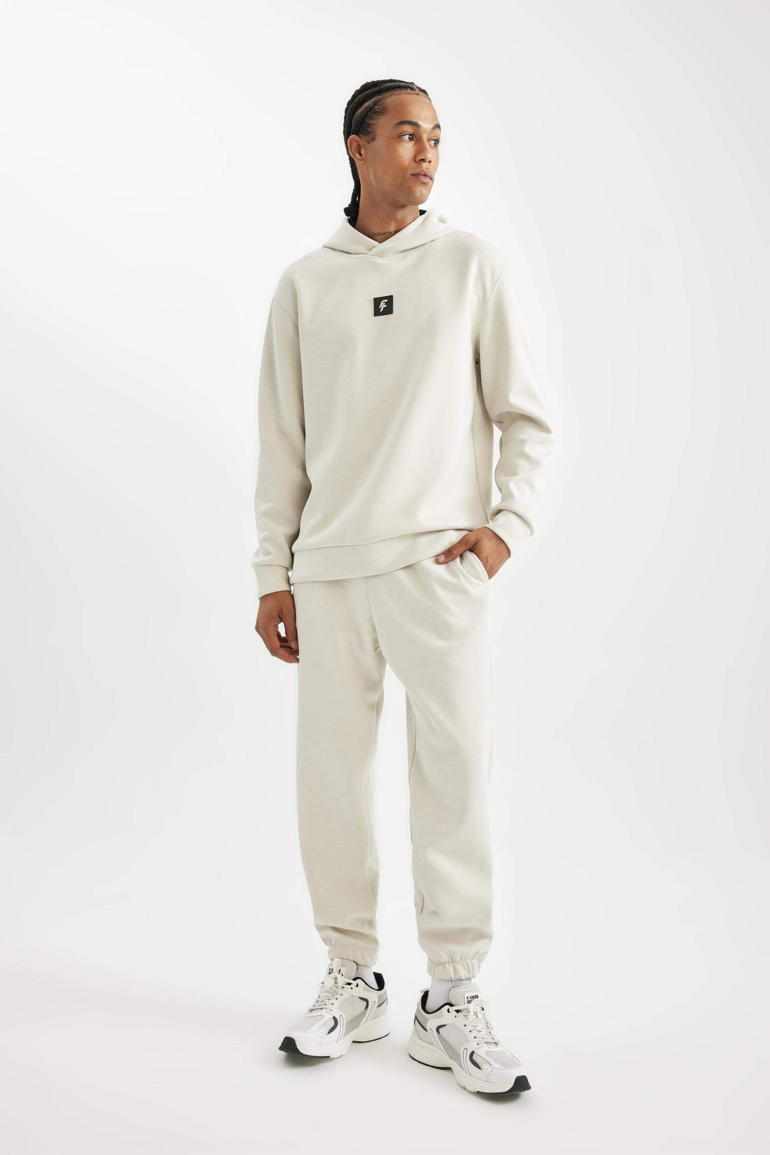 سويت شيرت رياضي قصة عادية قماش سكوبا من DeFactoFit