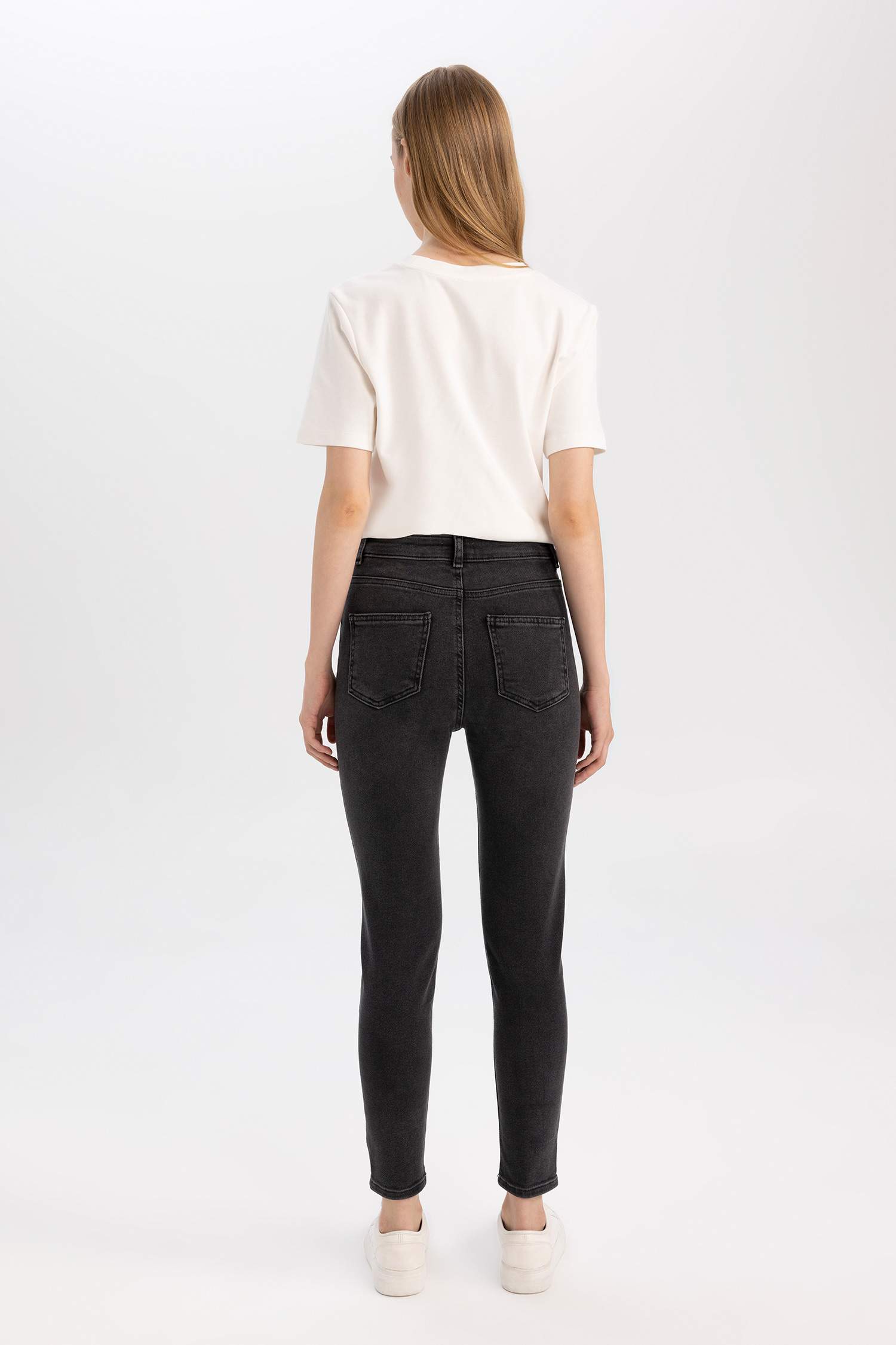 سروال جينز سكيني فيت بخصر عالي