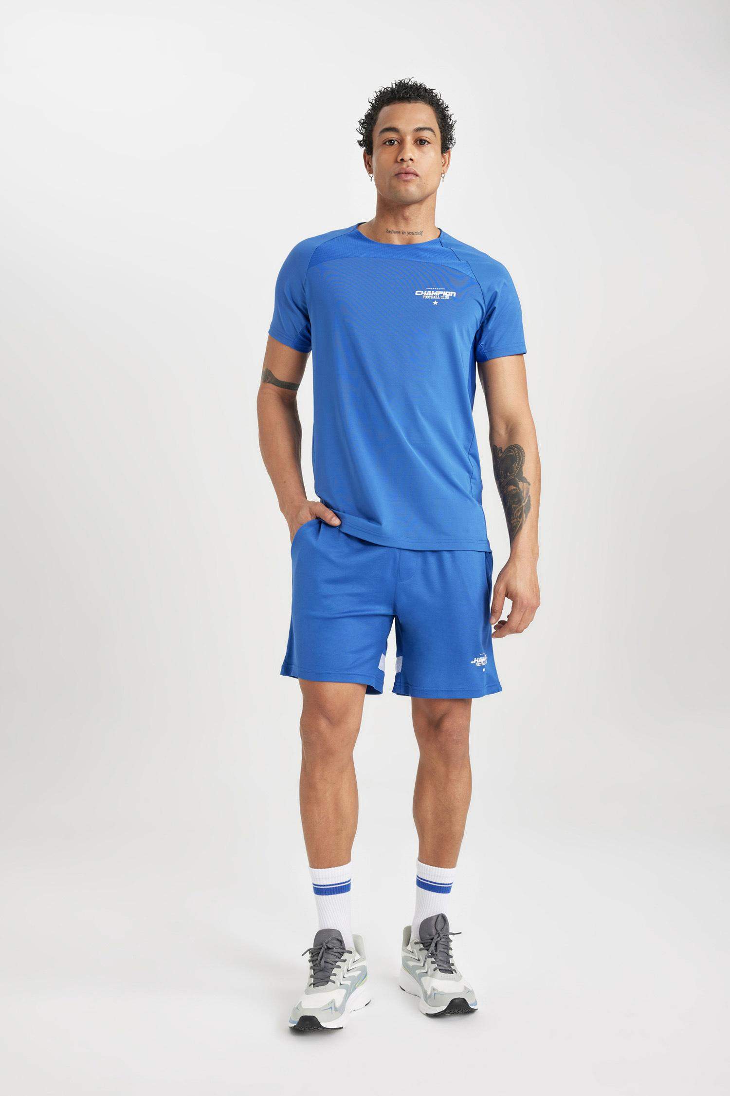 شورت رياضي قصير أزرق سليم فيت من DeFactoFit