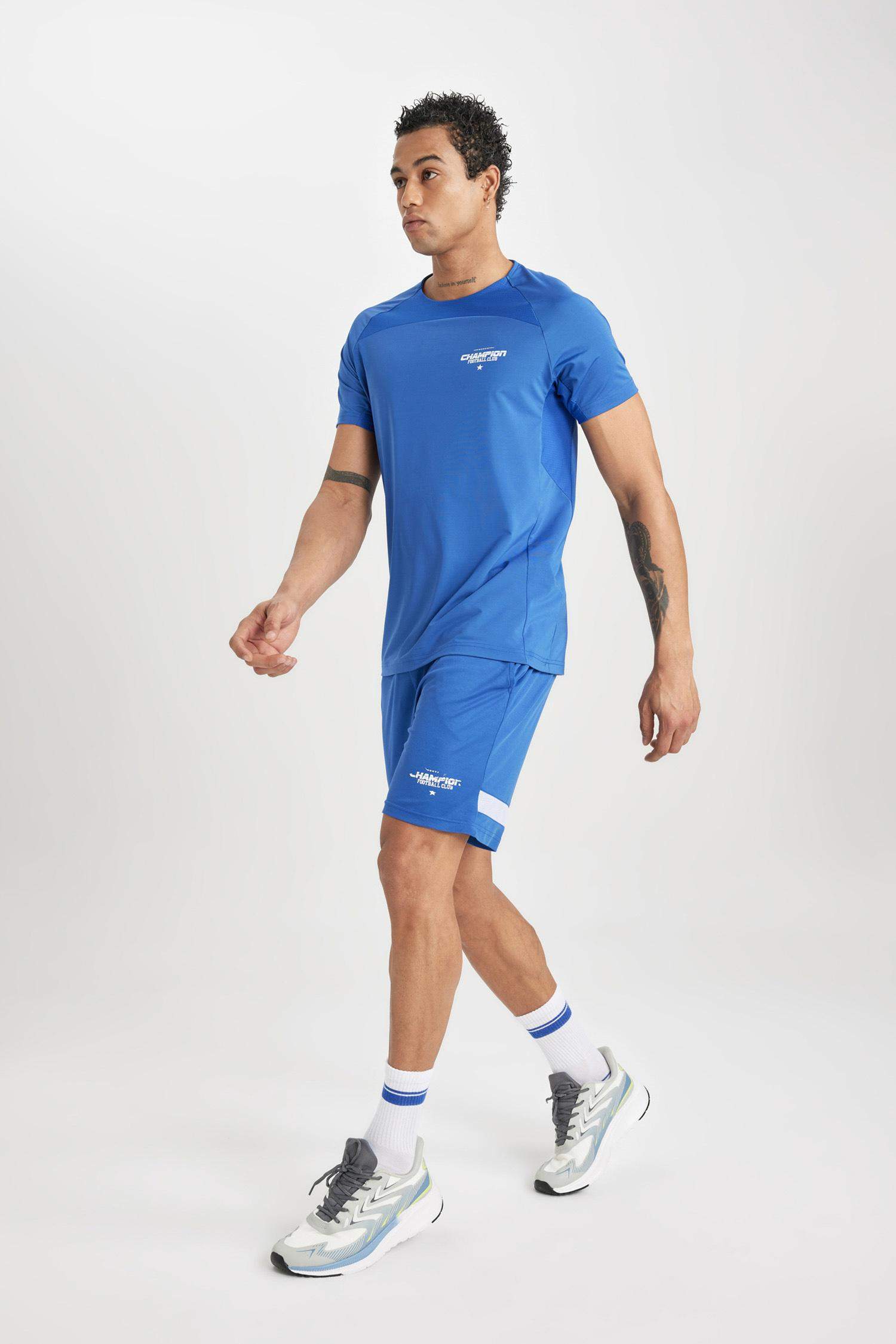 شورت رياضي قصير أزرق سليم فيت من DeFactoFit