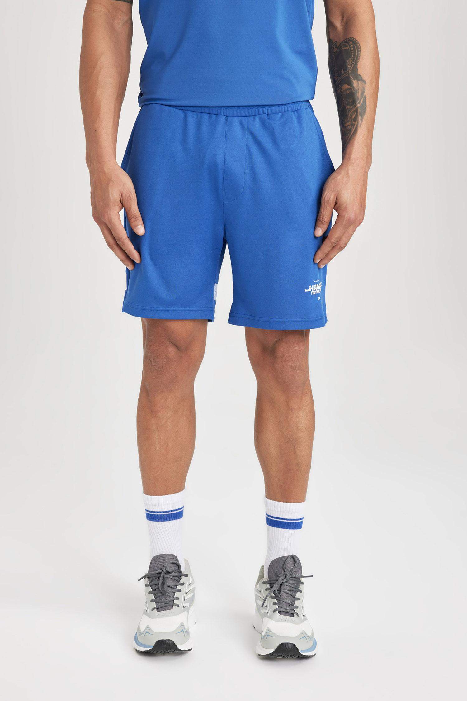 شورت رياضي قصير أزرق سليم فيت من DeFactoFit