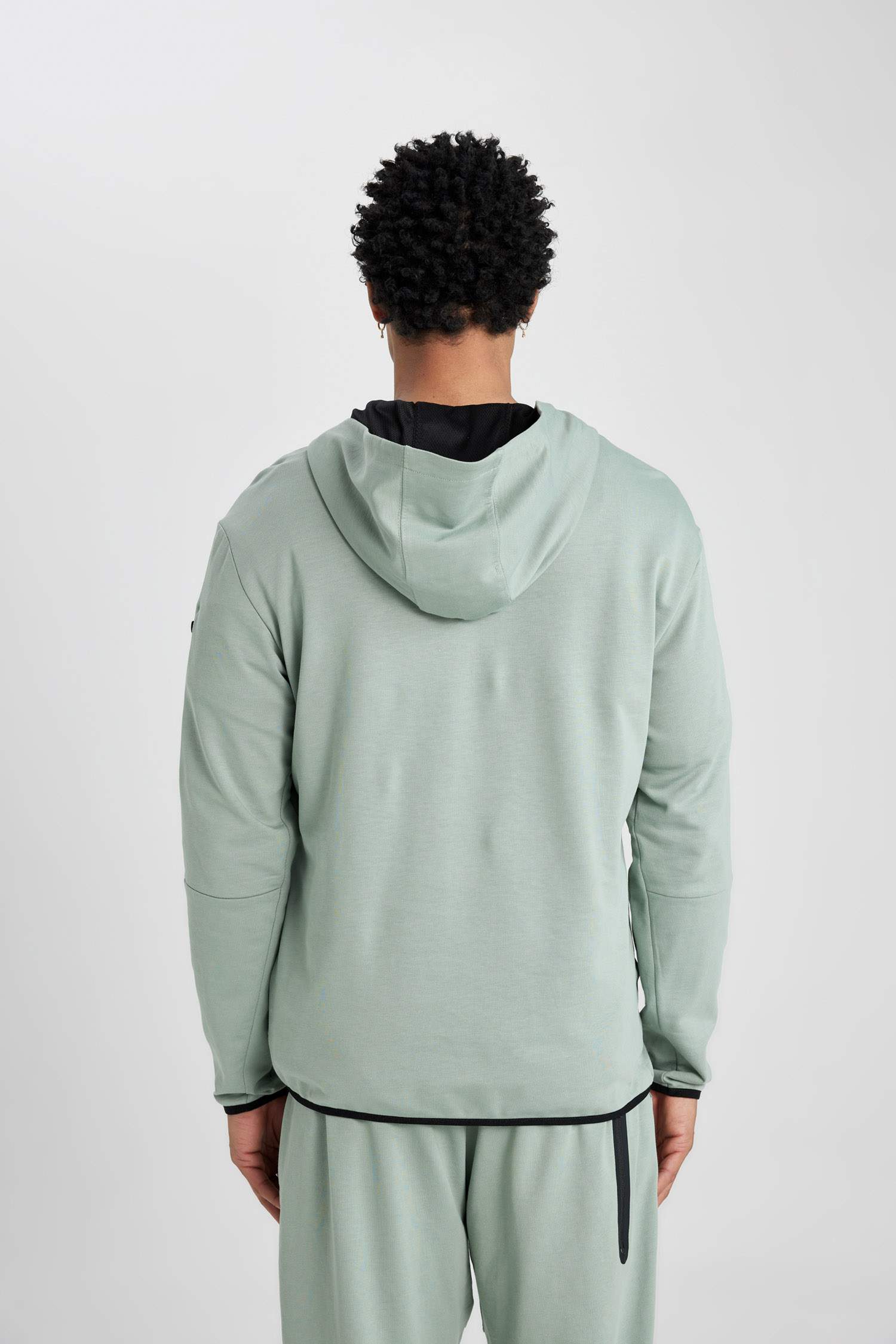 سويت شيرت قصة عادية بغطاء للرأس من DeFactoFit