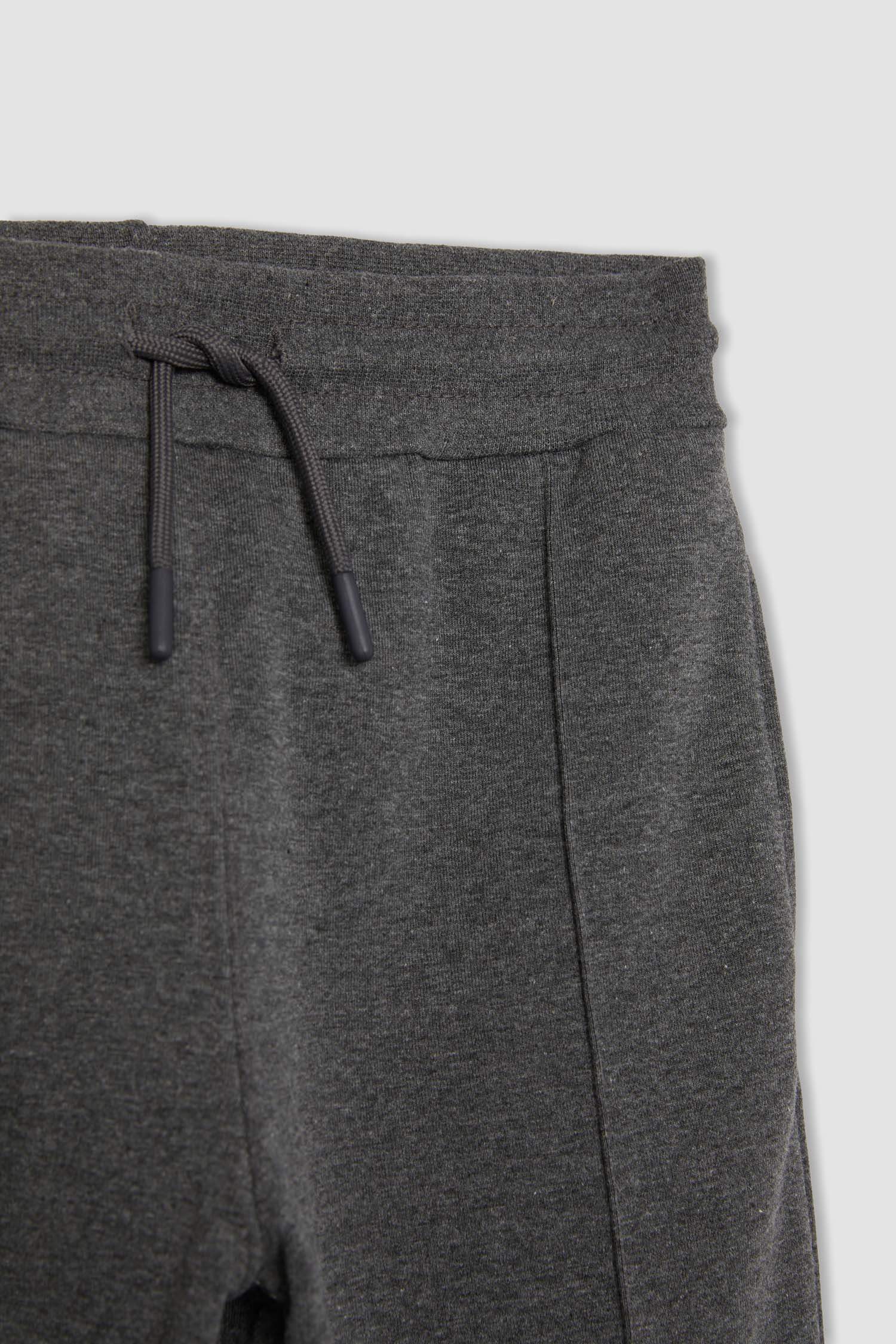 بنطلون بجامة رياضي اولادي قصة عادية