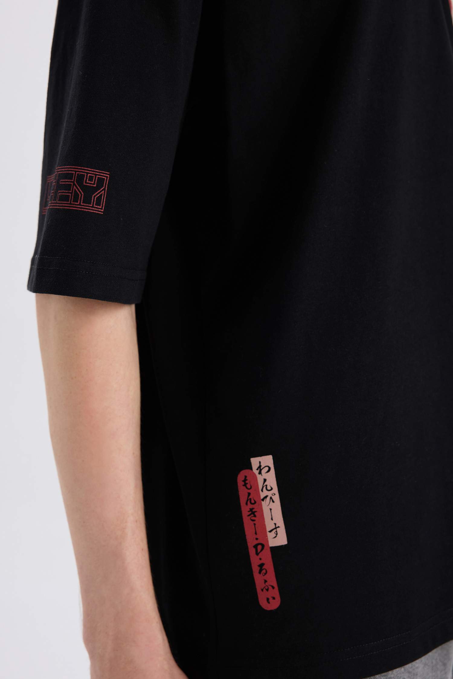 تيشيرت نص كم قصة فضفاضة مطبوع من ون بيس